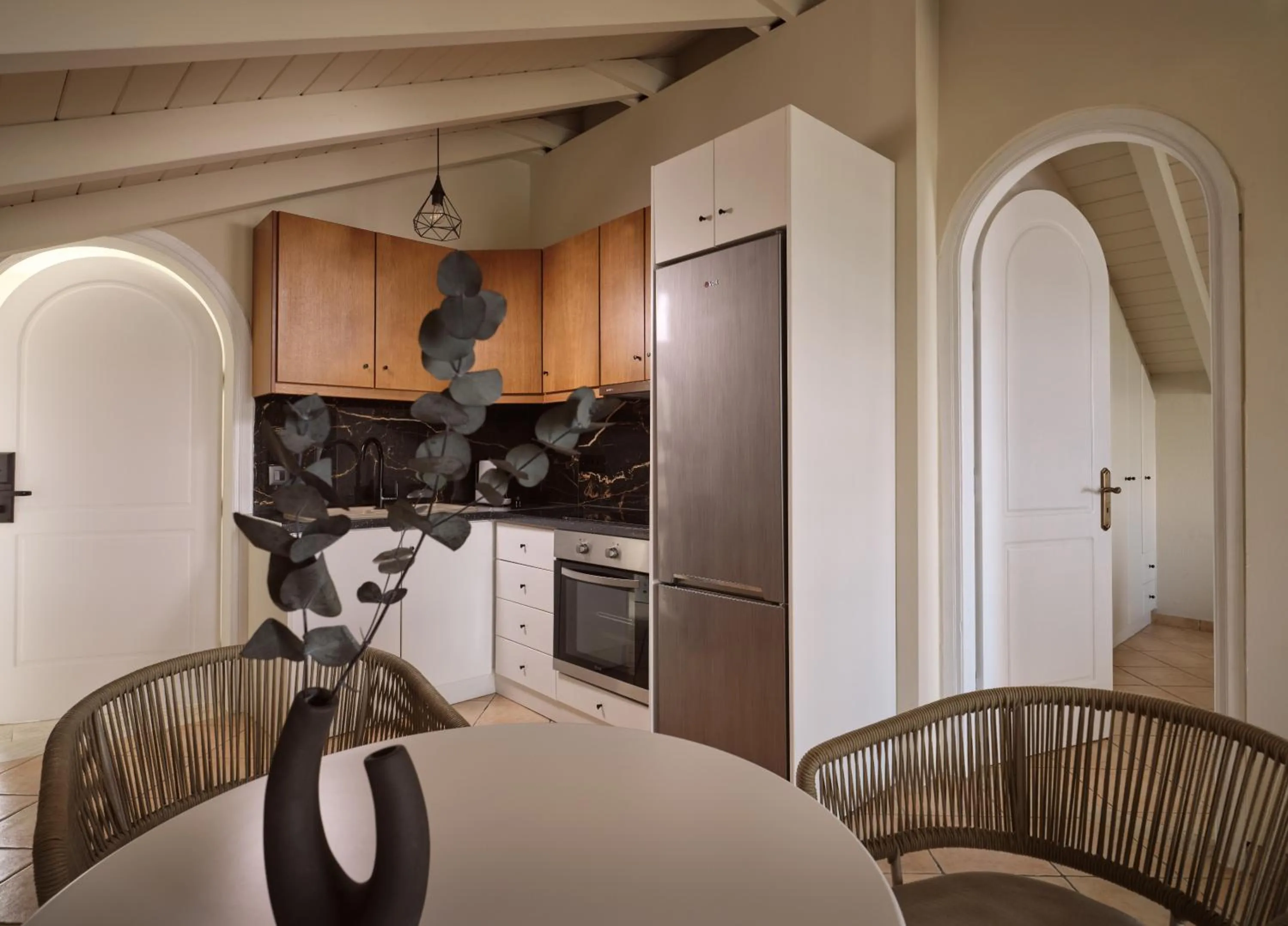 Kitchen or kitchenette in Nikon Boutique Hotel