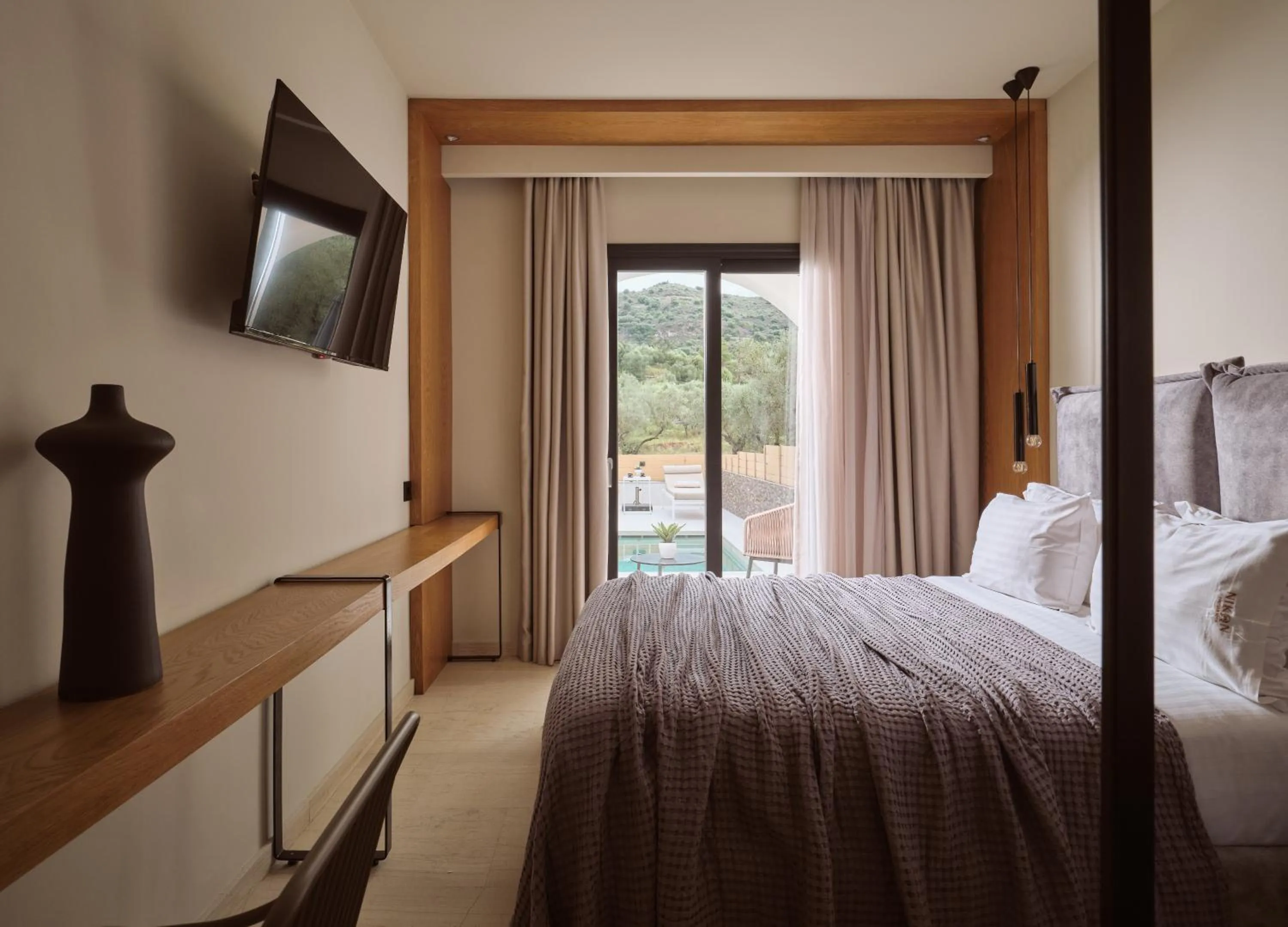 Bed in Nikon Boutique Hotel