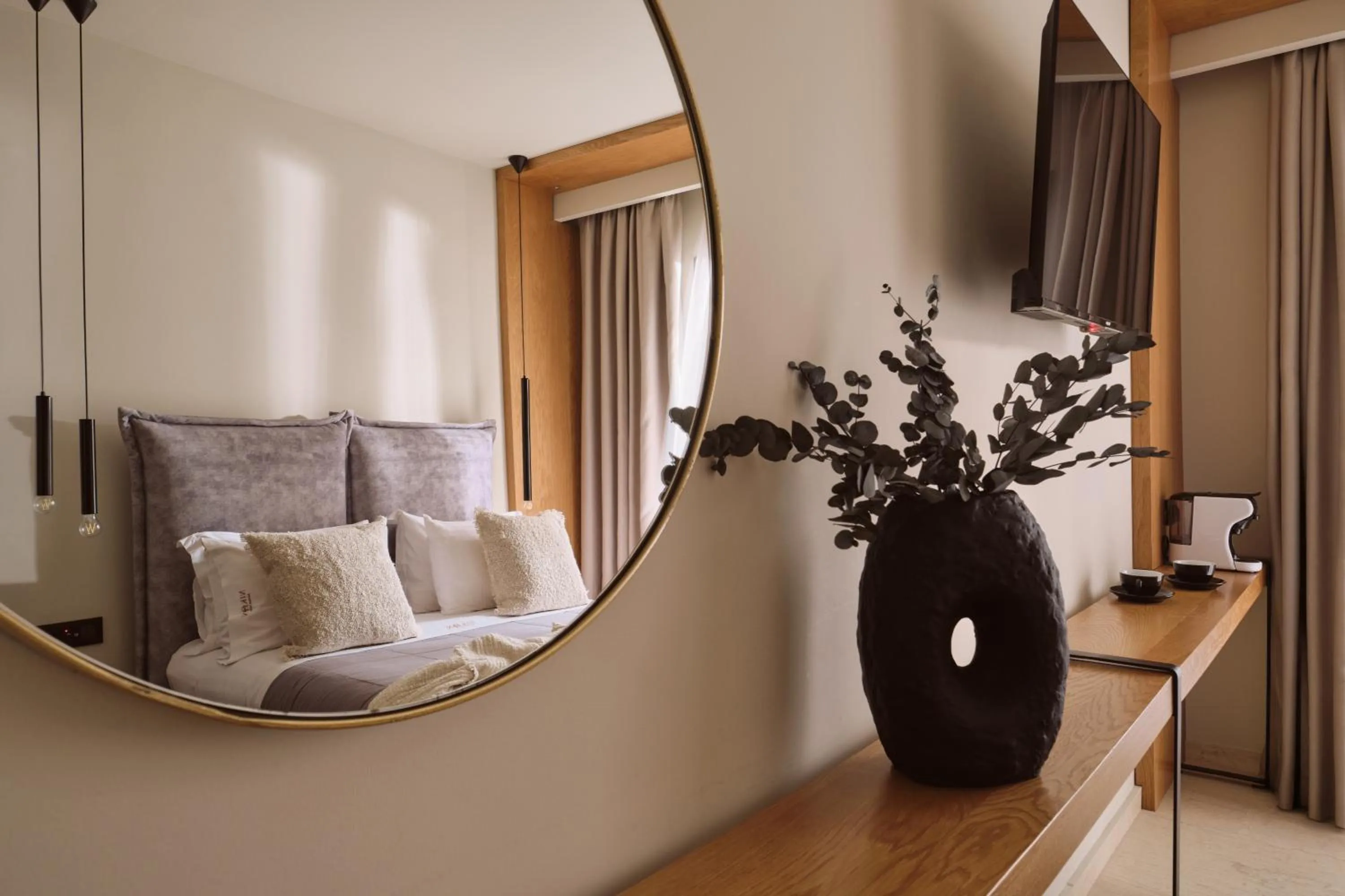 Bed in Nikon Boutique Hotel