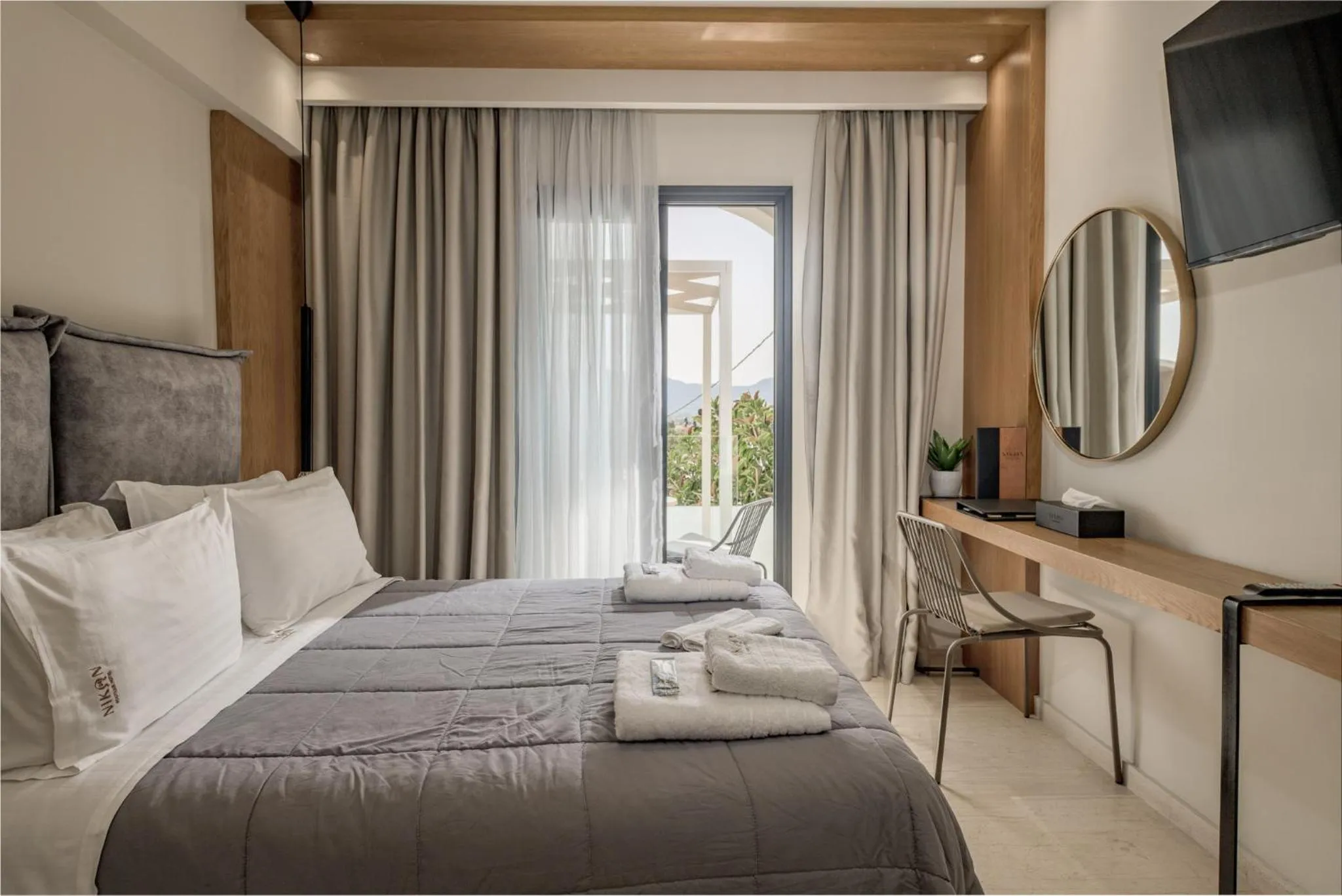 Bed in Nikon Boutique Hotel