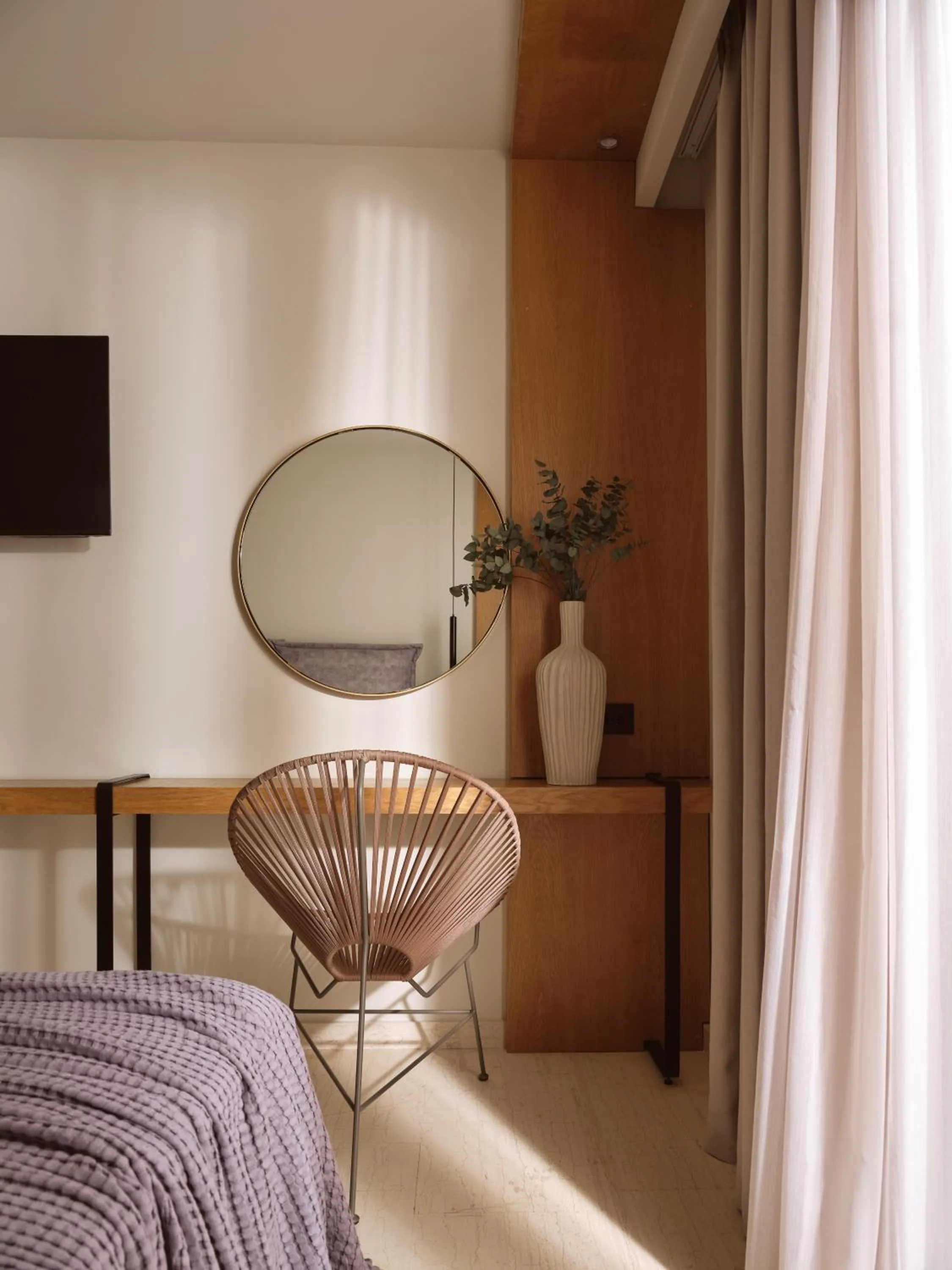 Bed in Nikon Boutique Hotel