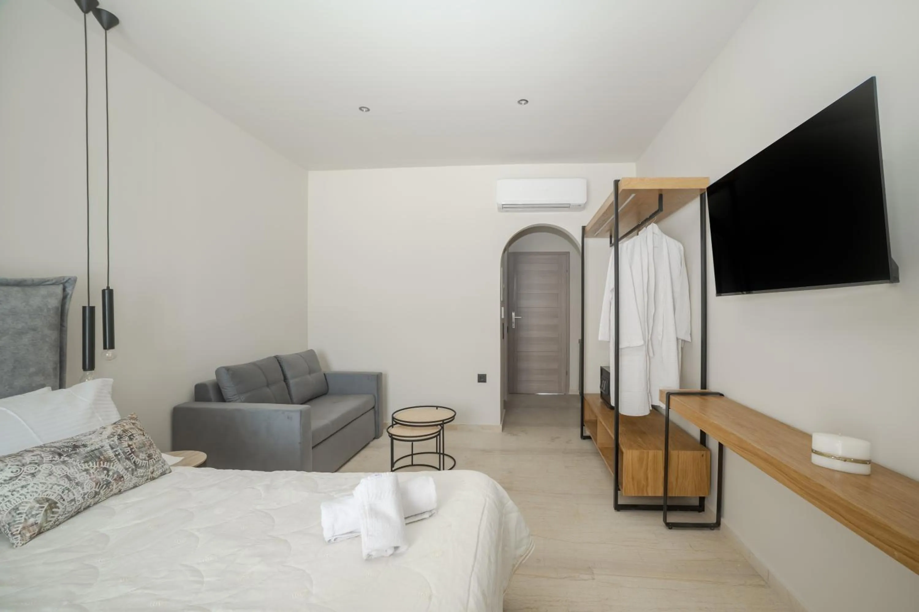 Photo of the whole room, Bed in Nikon Boutique Hotel