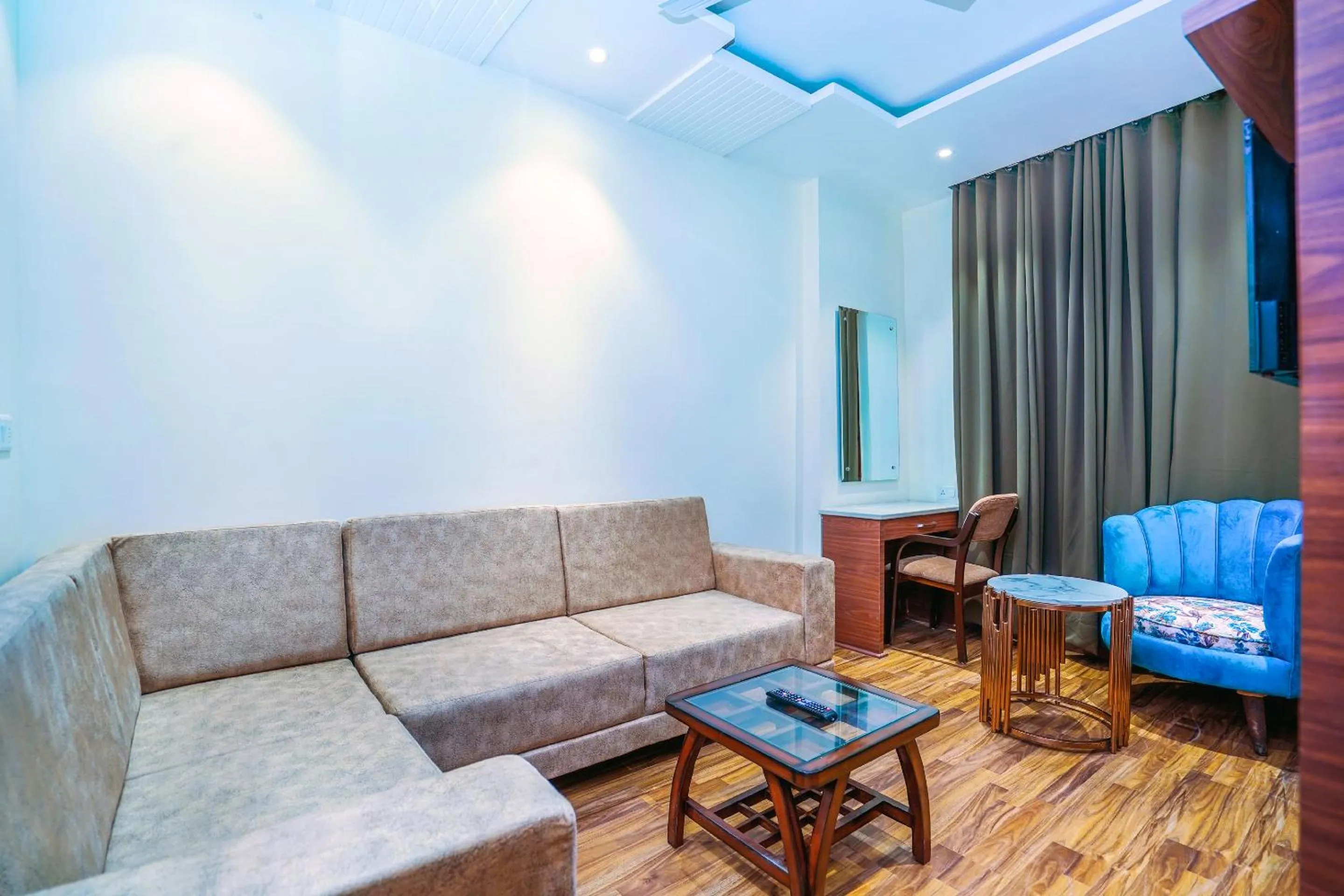 Seating area in Hotel Aura Grand By Levelup Hotels