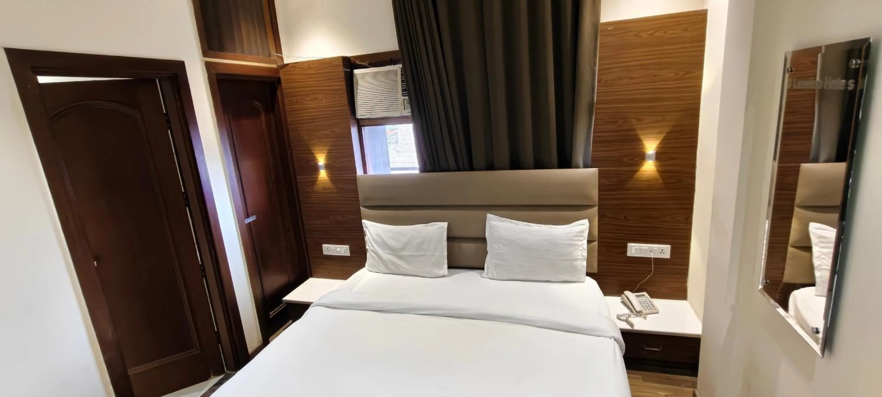Bed in Hotel Aura Grand By Levelup Hotels