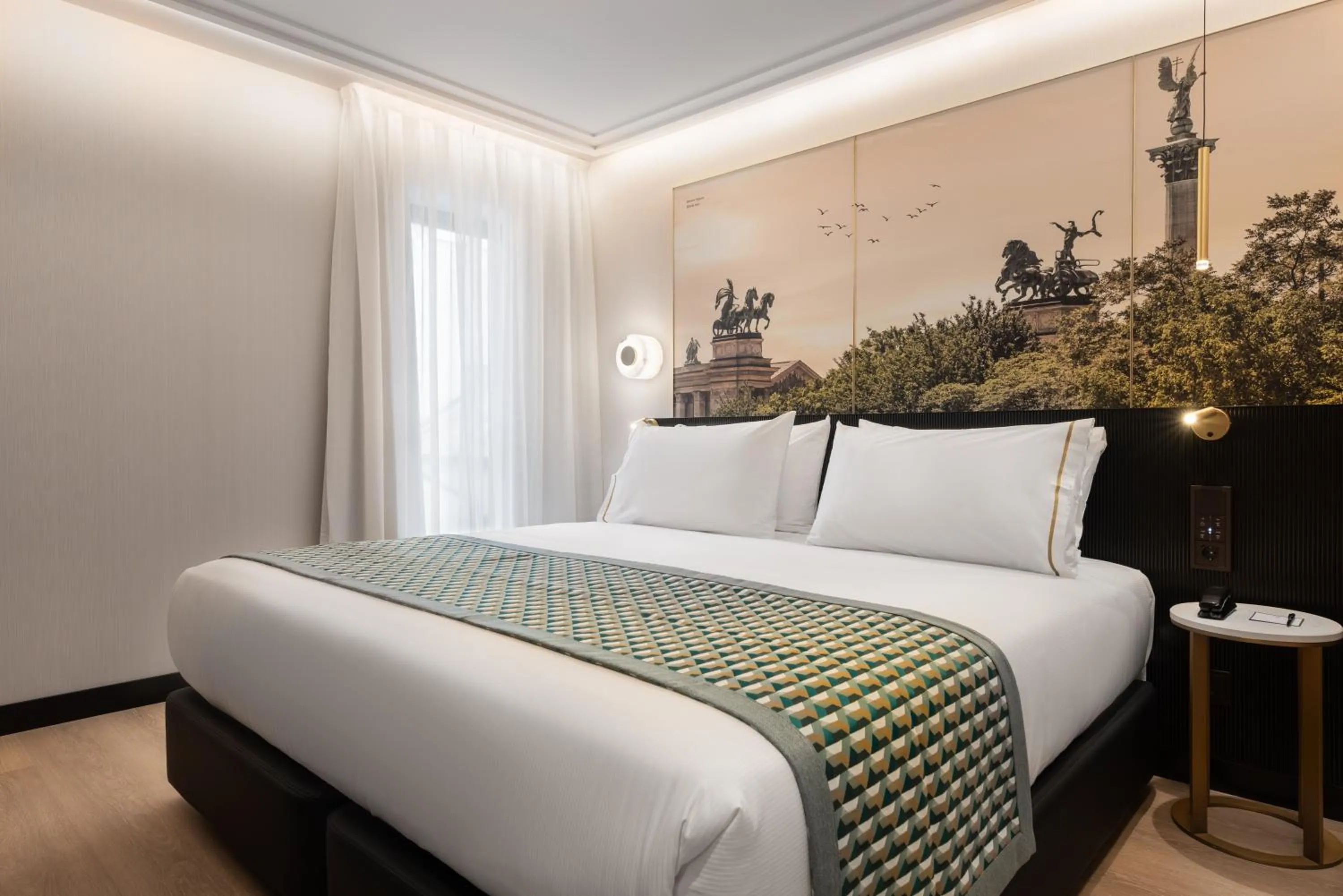 Bed in Eurostars Ambassador