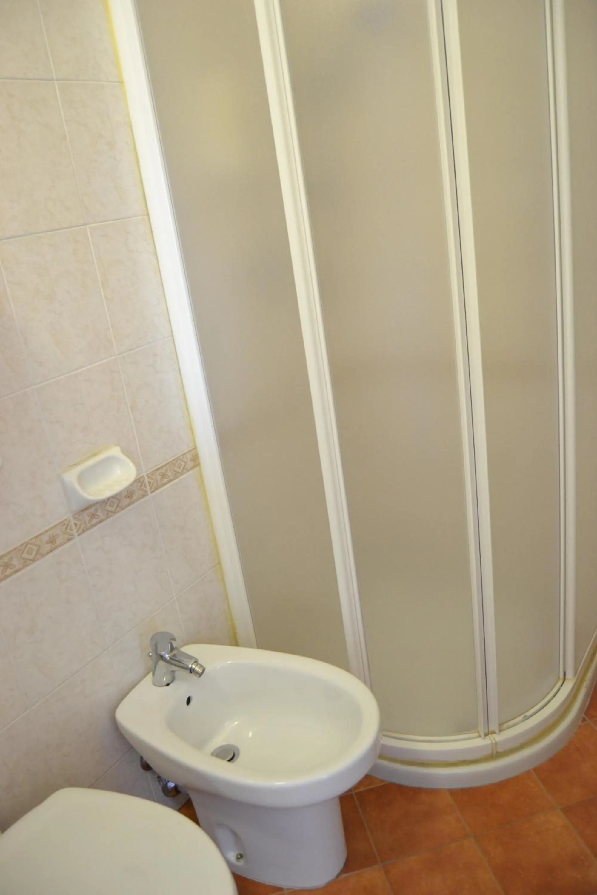 Toilet in Hotel Apis