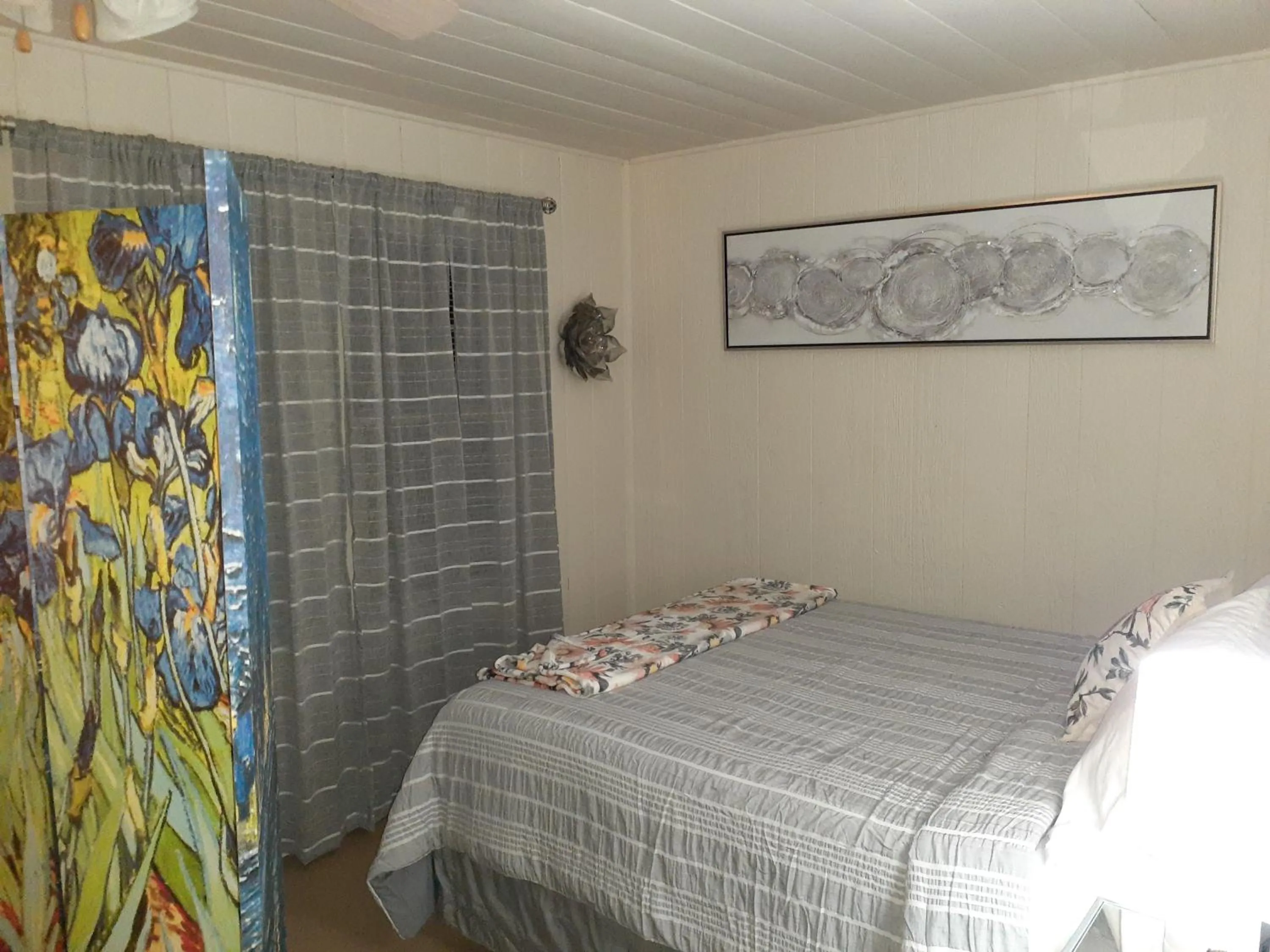 Bed in Edgewater Resort Cottage #1