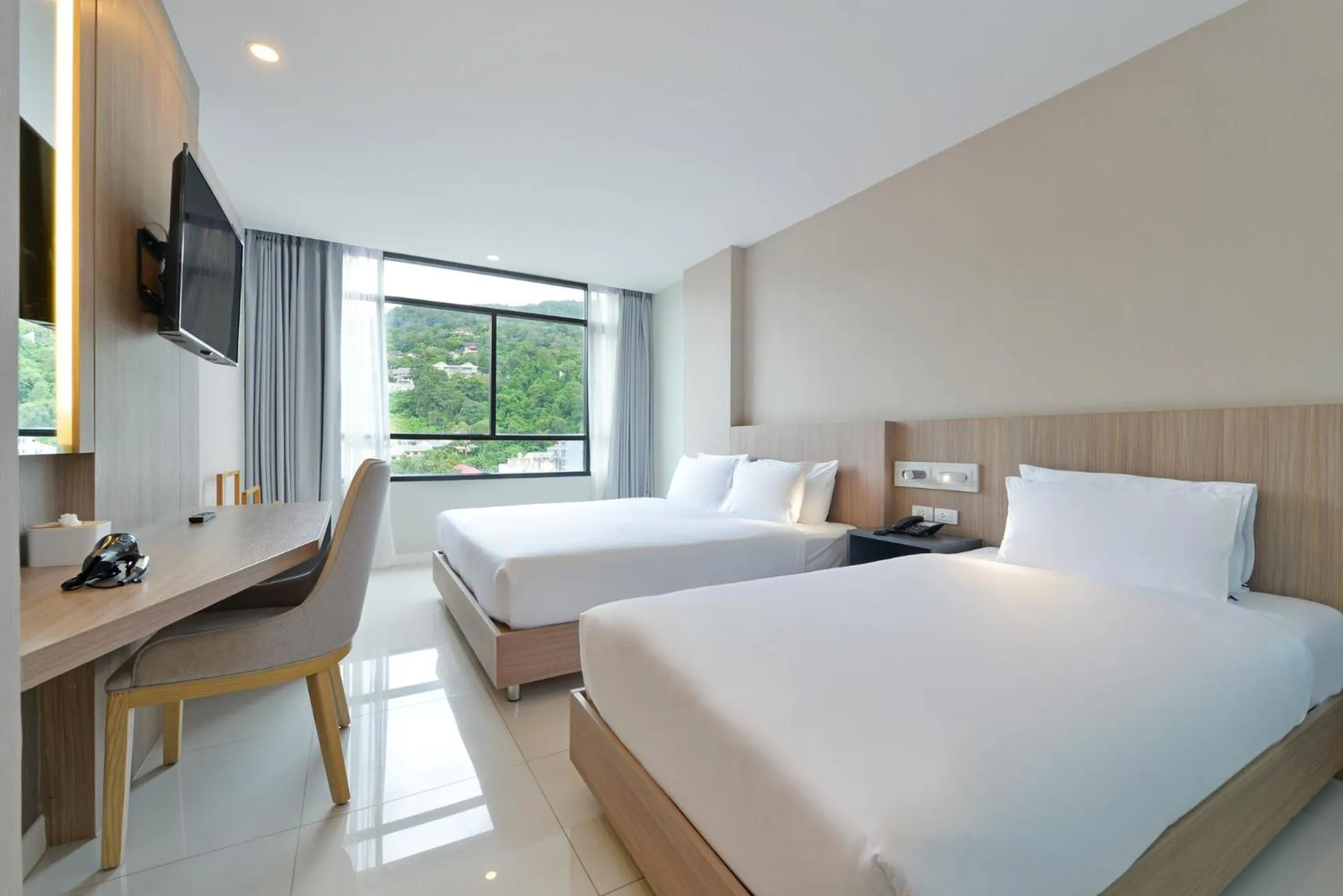Bed in Grace Patong Hotel
