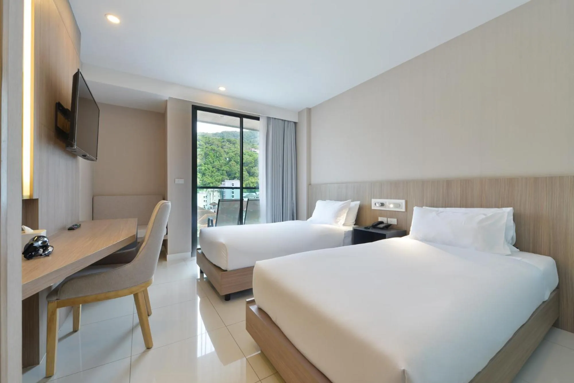 Bed in Grace Patong Hotel