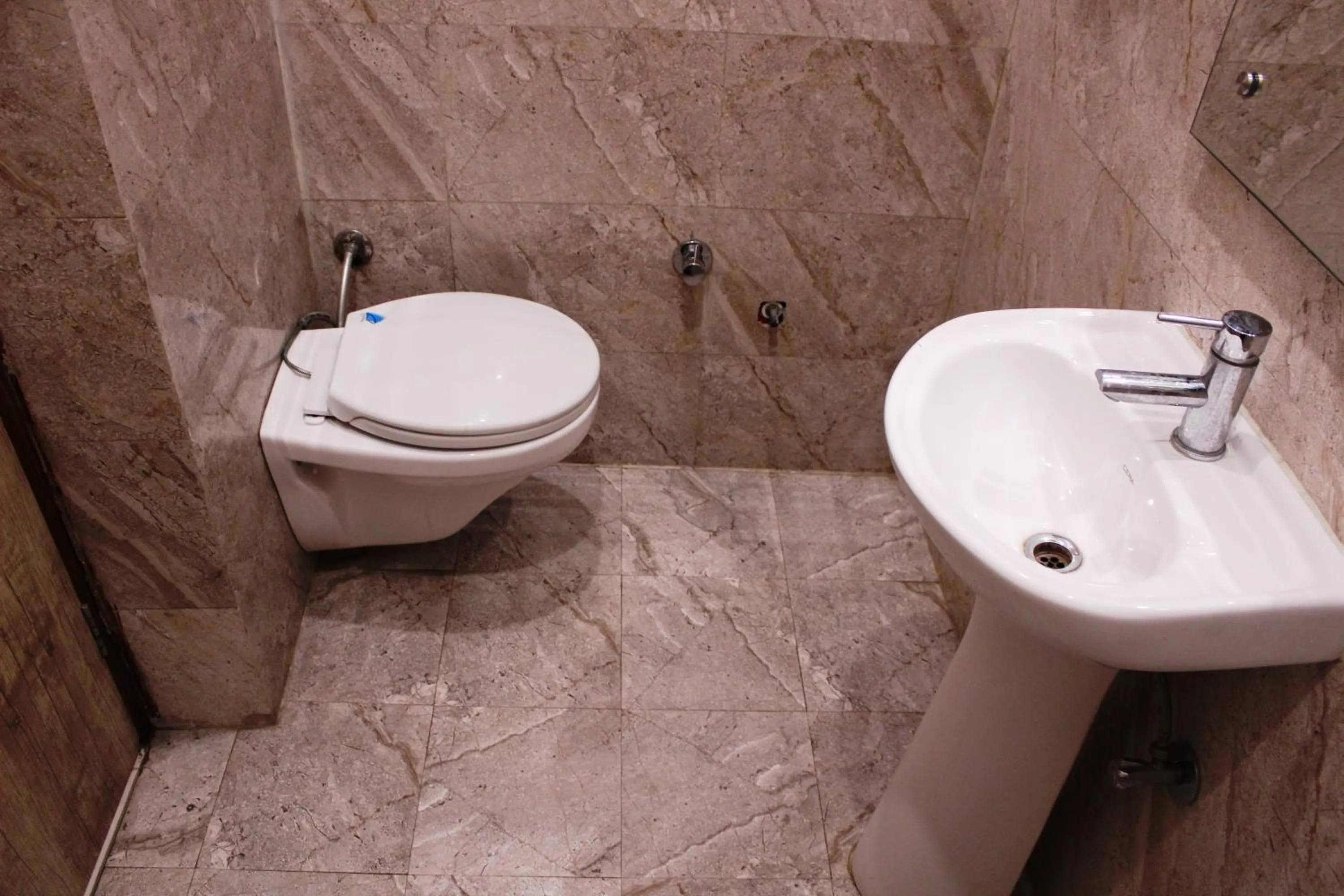 Bathroom in Shree Krishna Hotels