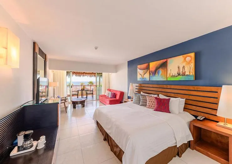 Bed in Grand Decameron Los Cabos, A Trademark All-Inclusive Resort