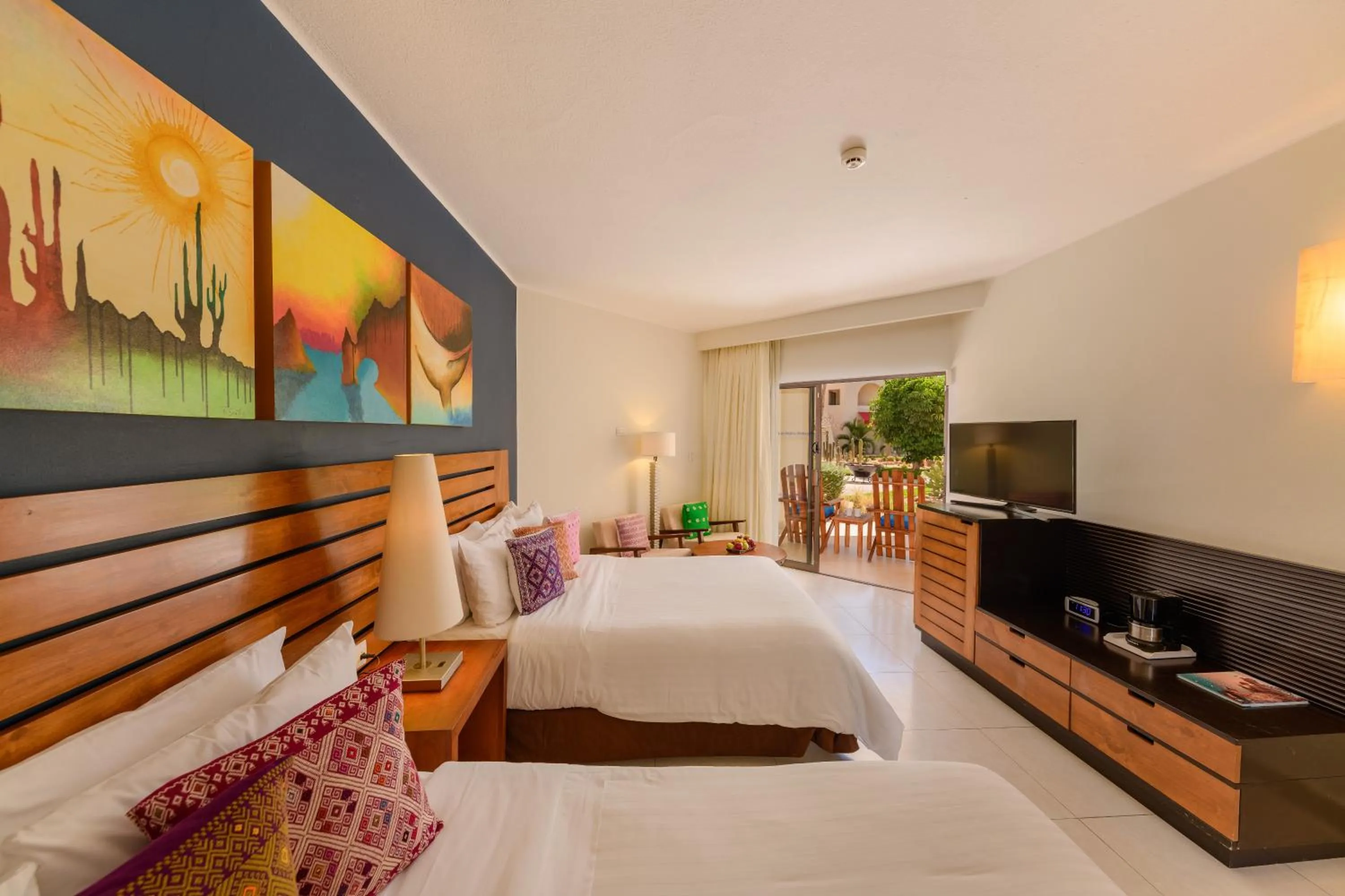 Bed in Grand Decameron Los Cabos, A Trademark All-Inclusive Resort