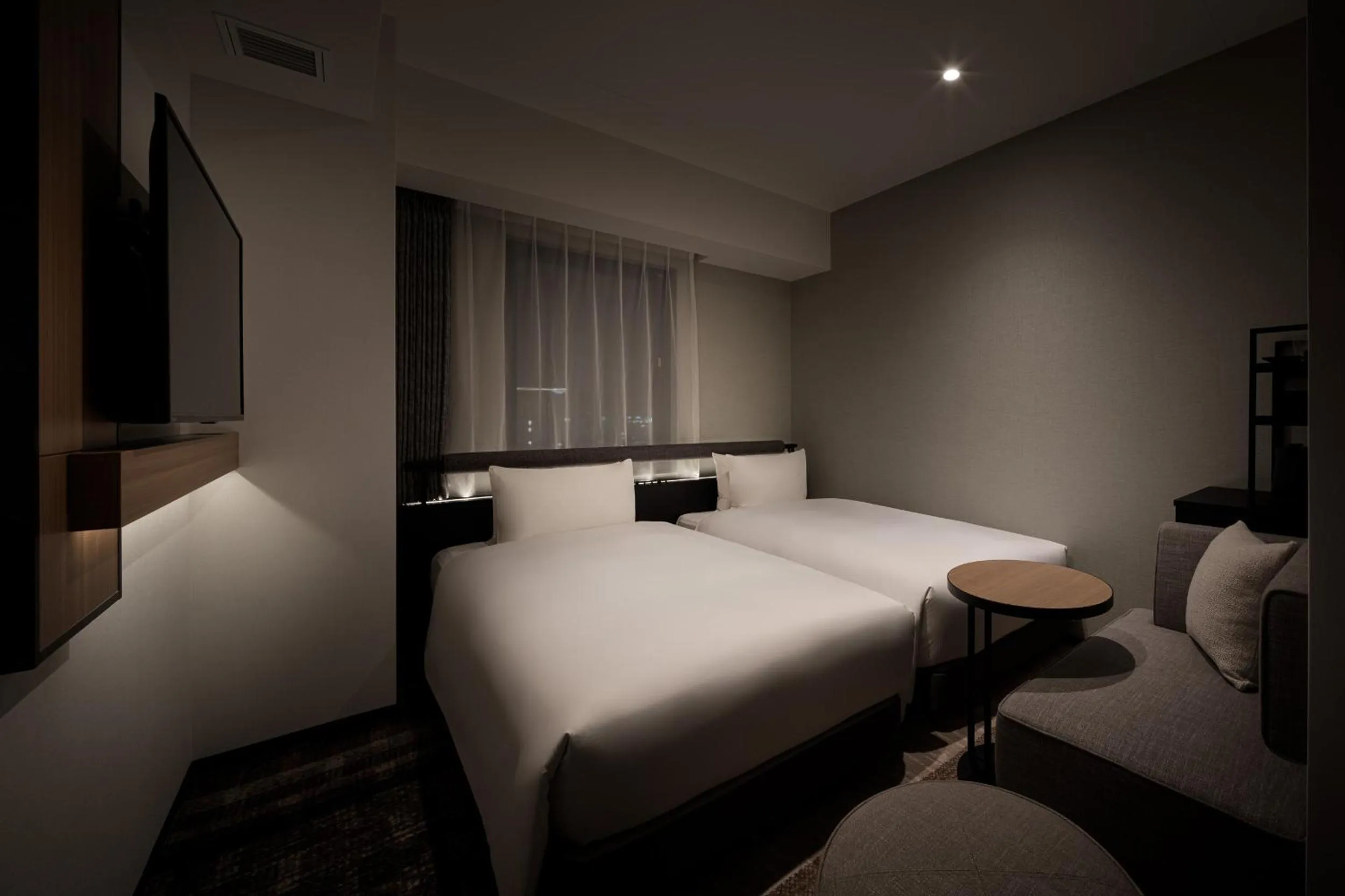 Photo of the whole room, Bed in Nest Hotel Naha Nishi