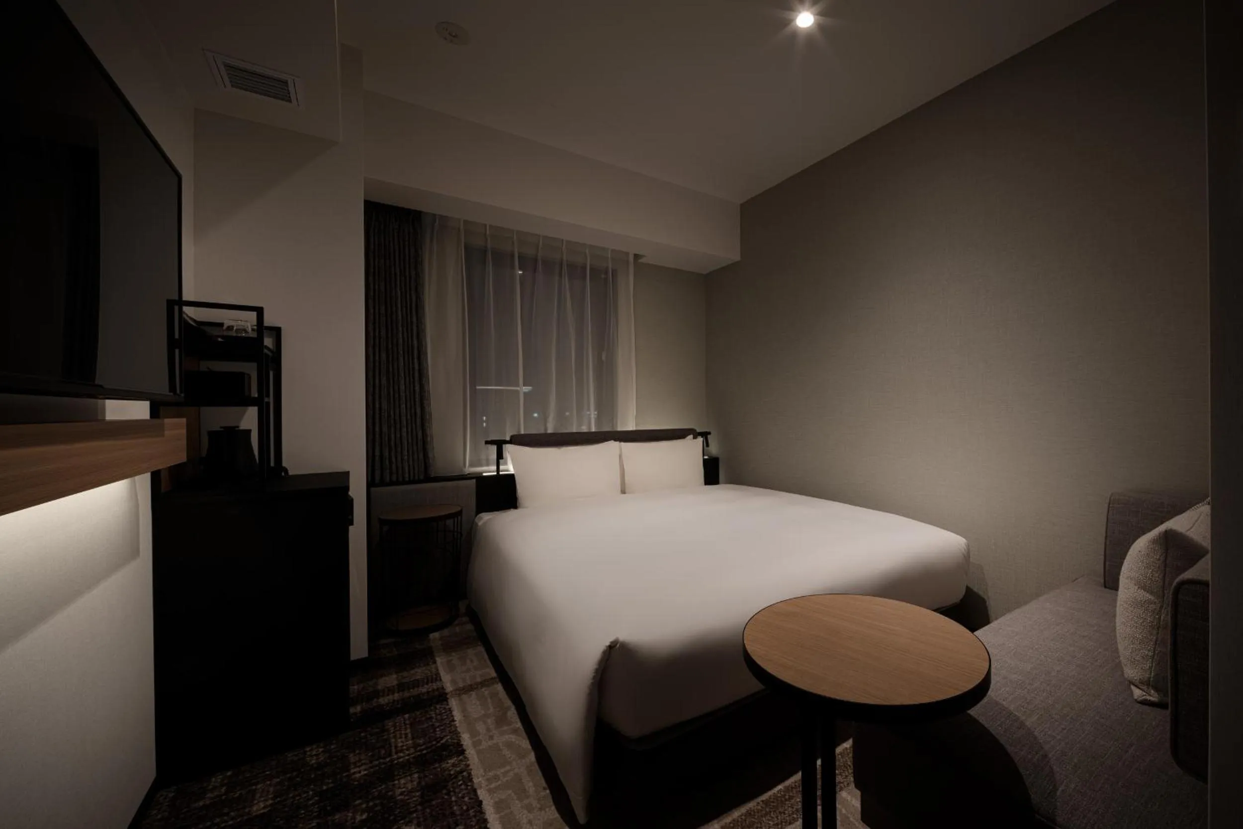 Photo of the whole room, Bed in Nest Hotel Naha Nishi