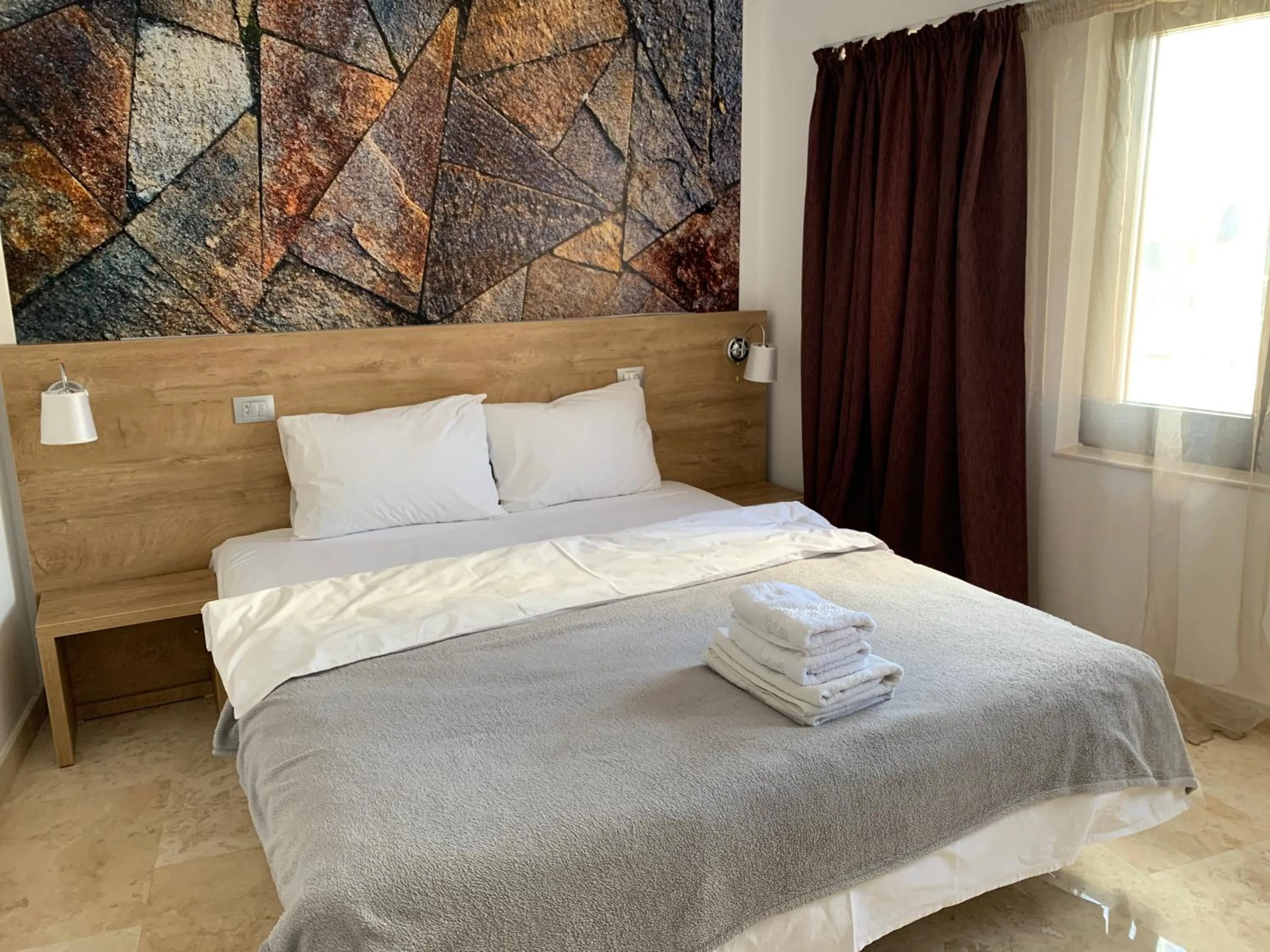 Bed in Dacia Residence Apartments