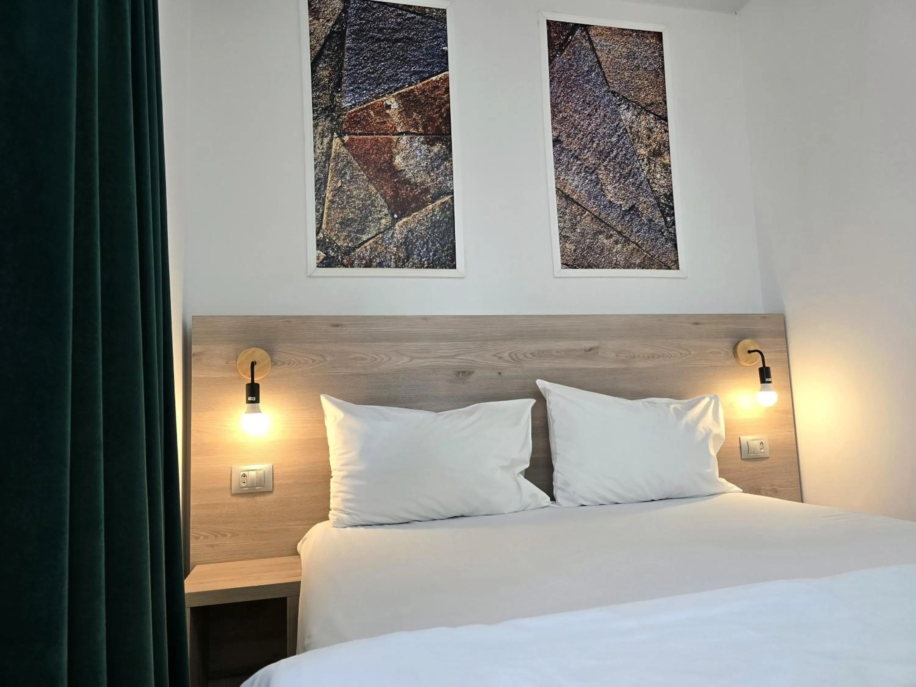 Bed in Dacia Residence Apartments