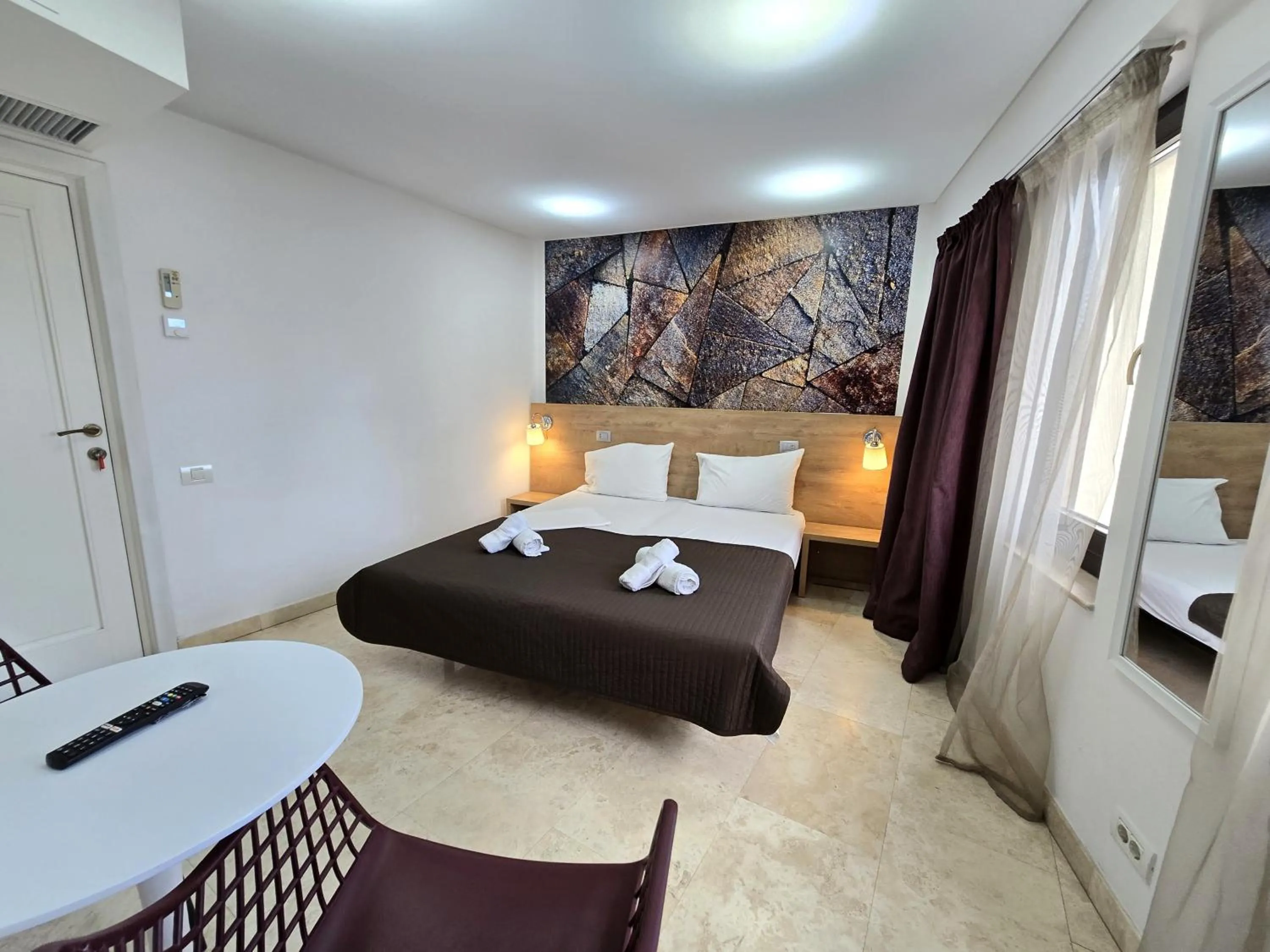 Bed in Dacia Residence Apartments