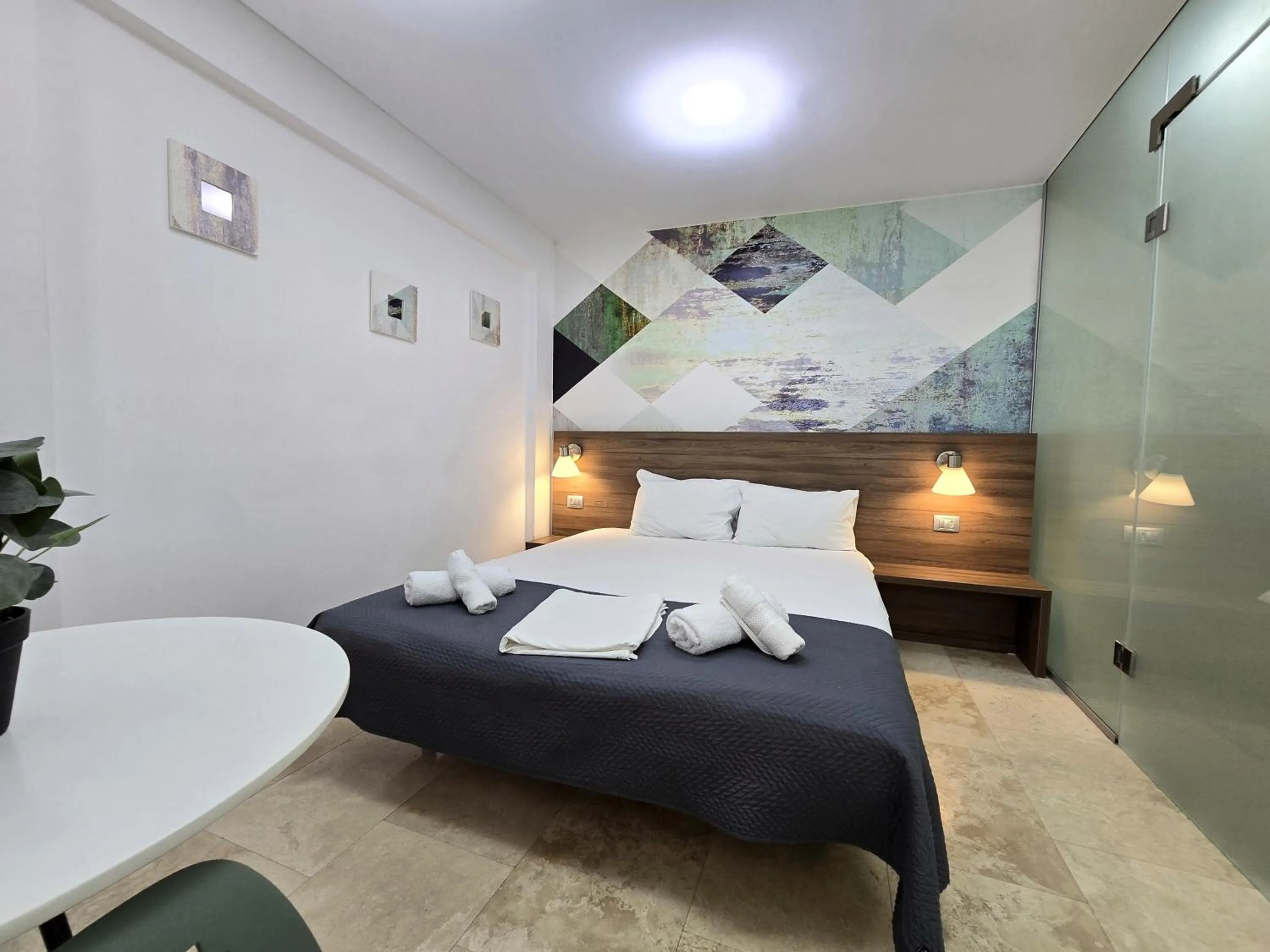 Bed in Dacia Residence Apartments