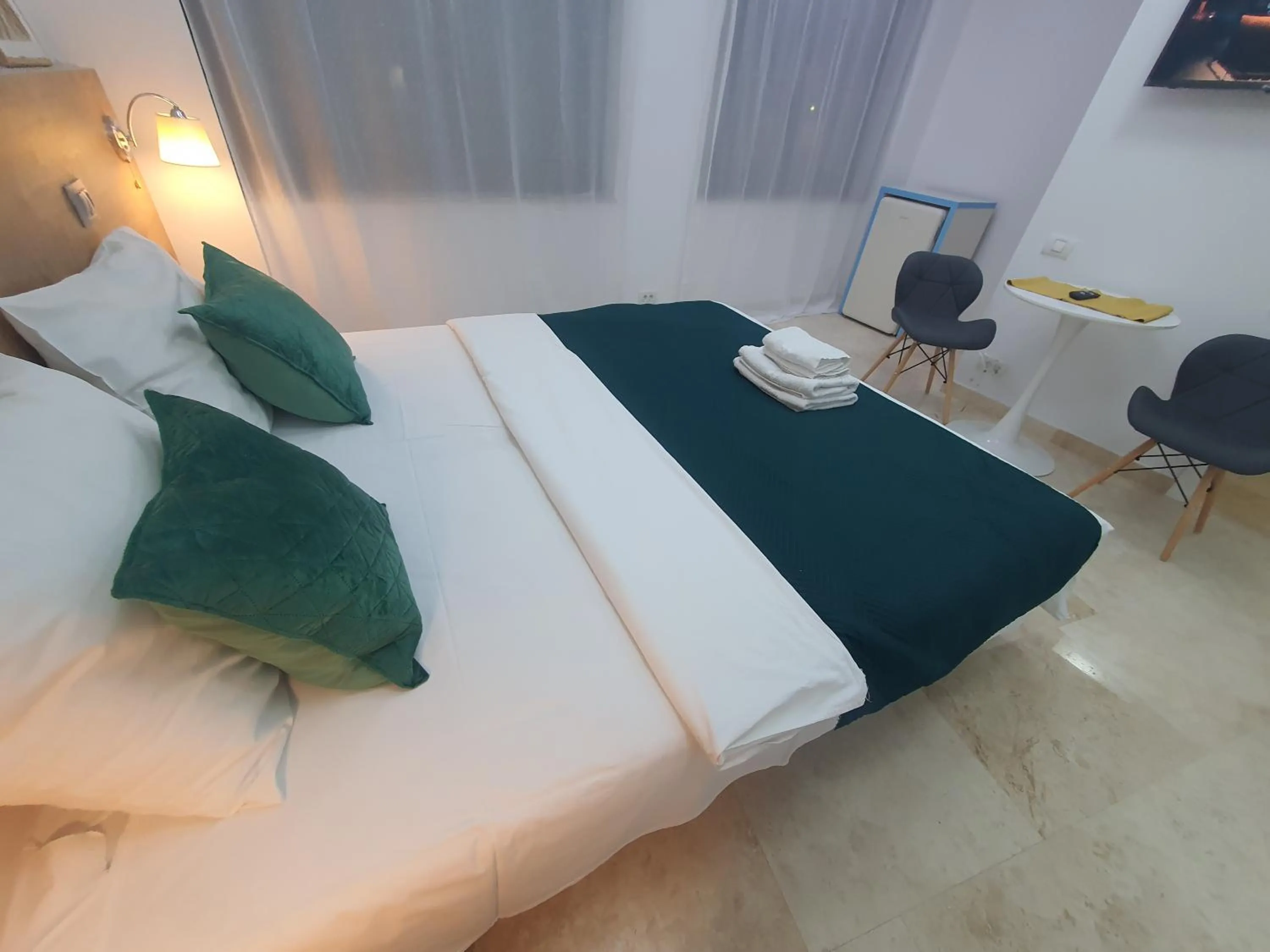 Bed in Dacia Residence Apartments