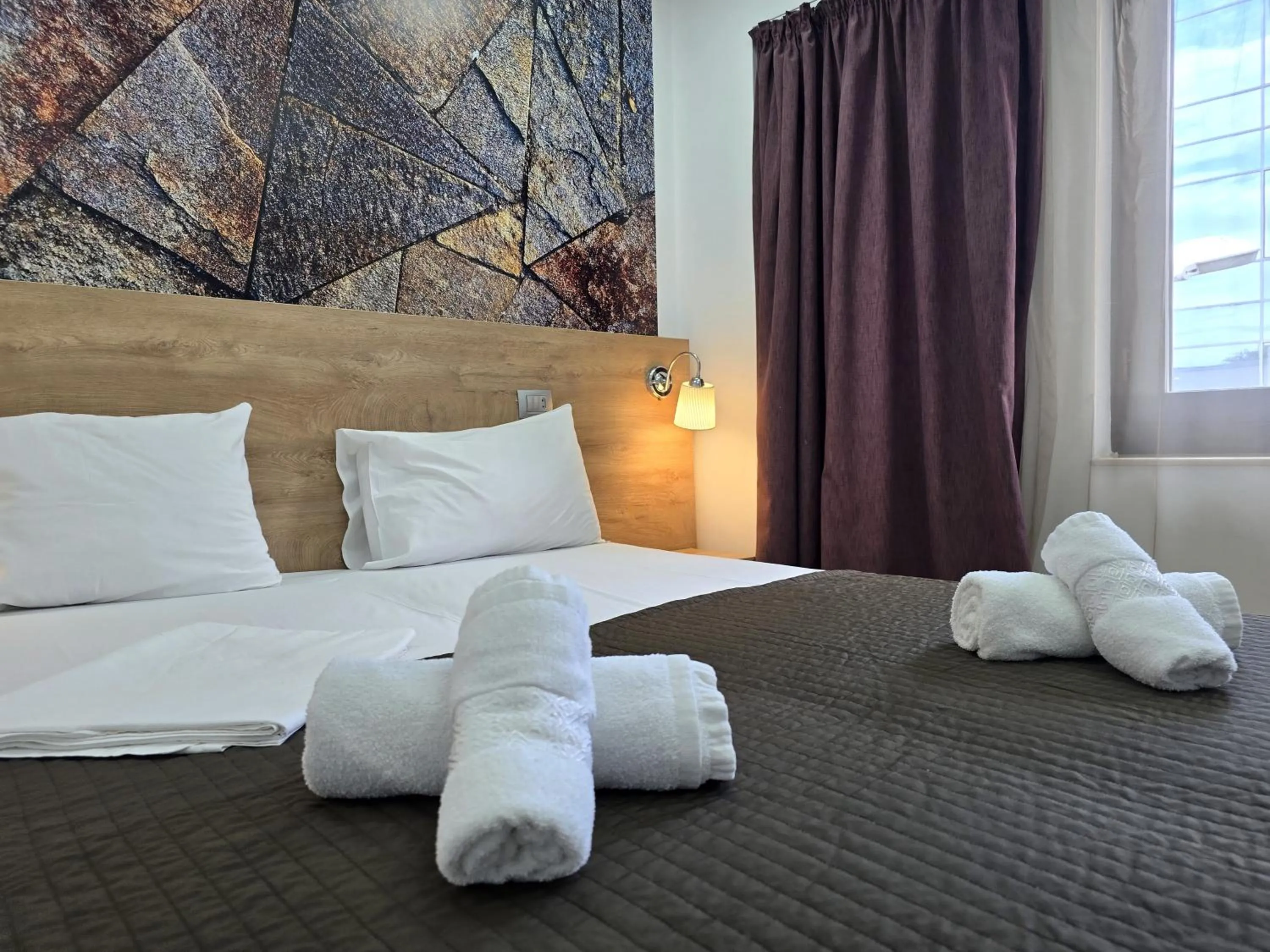 Bed in Dacia Residence Apartments