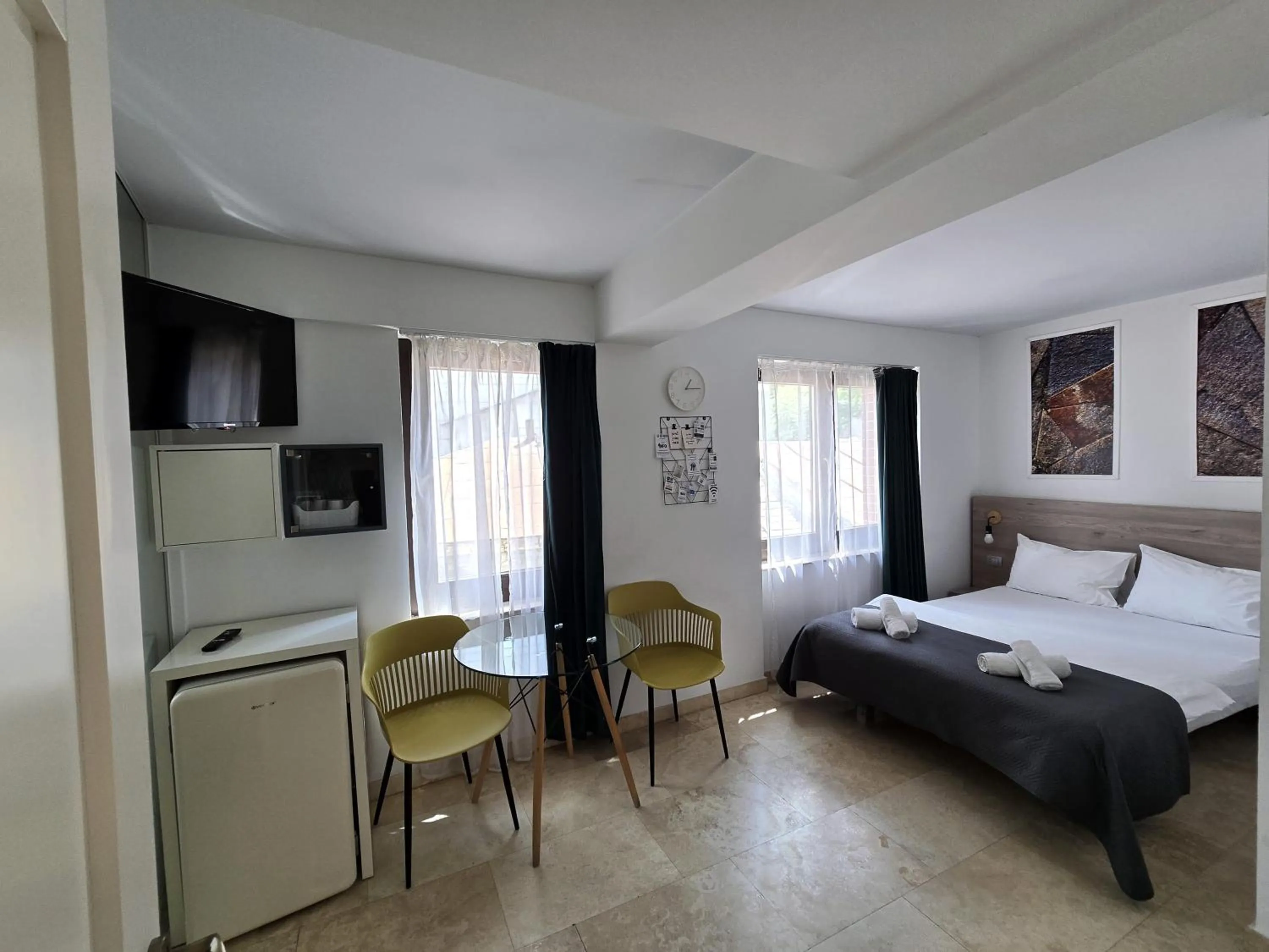 Bed in Dacia Residence Apartments