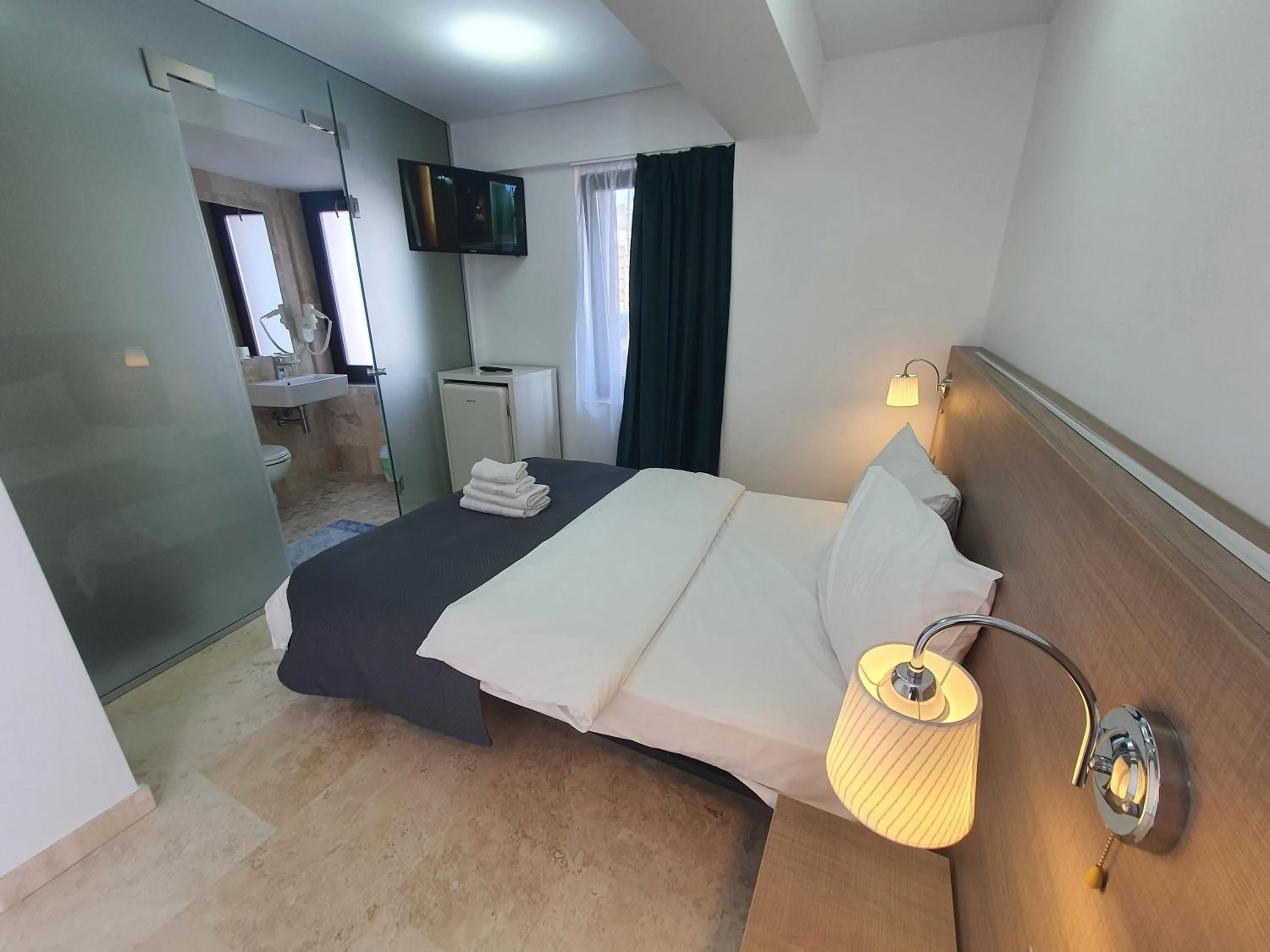 Bed in Dacia Residence Apartments