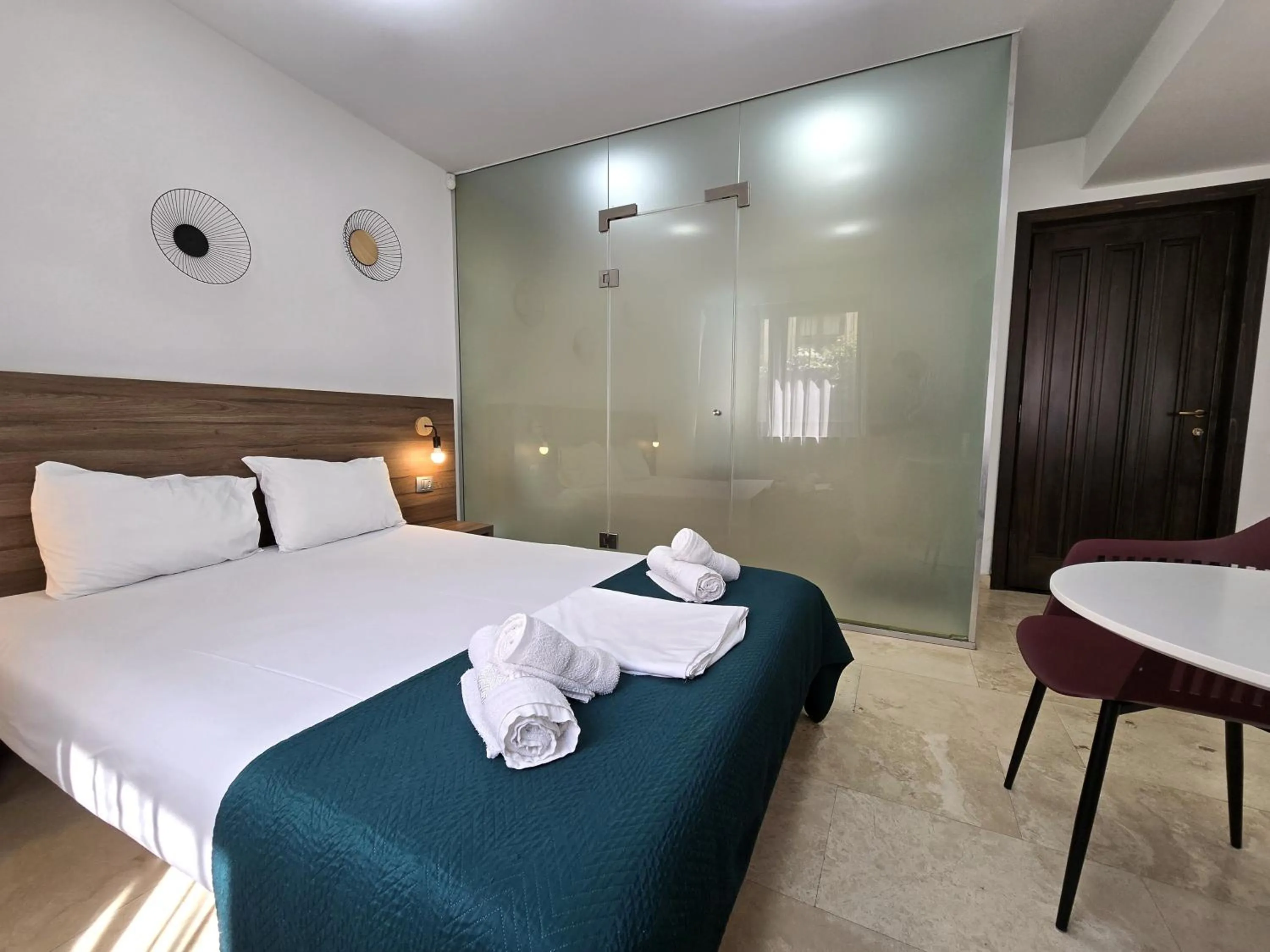 Bed in Dacia Residence Apartments