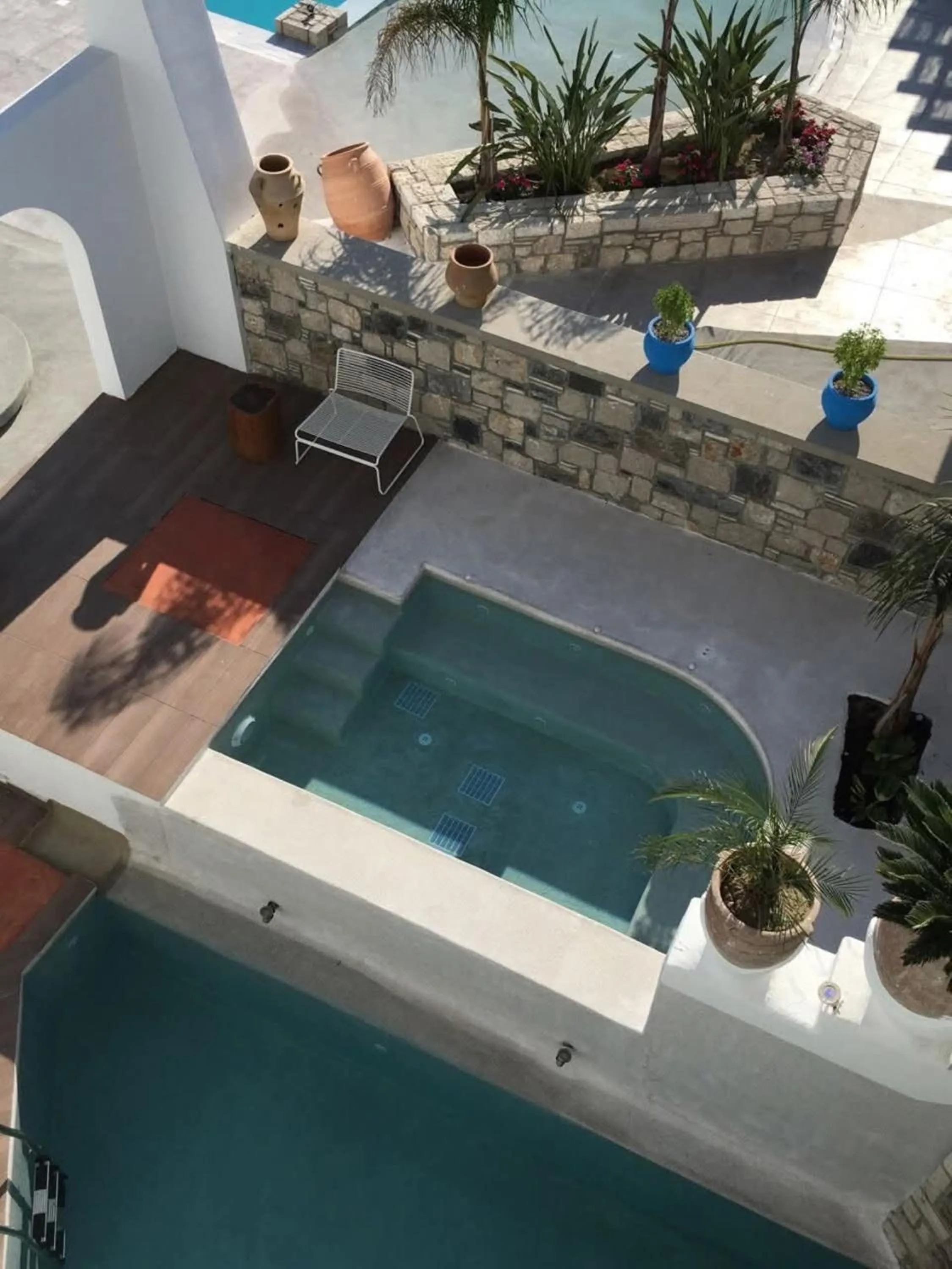 Swimming pool in Kouros Home & Suites