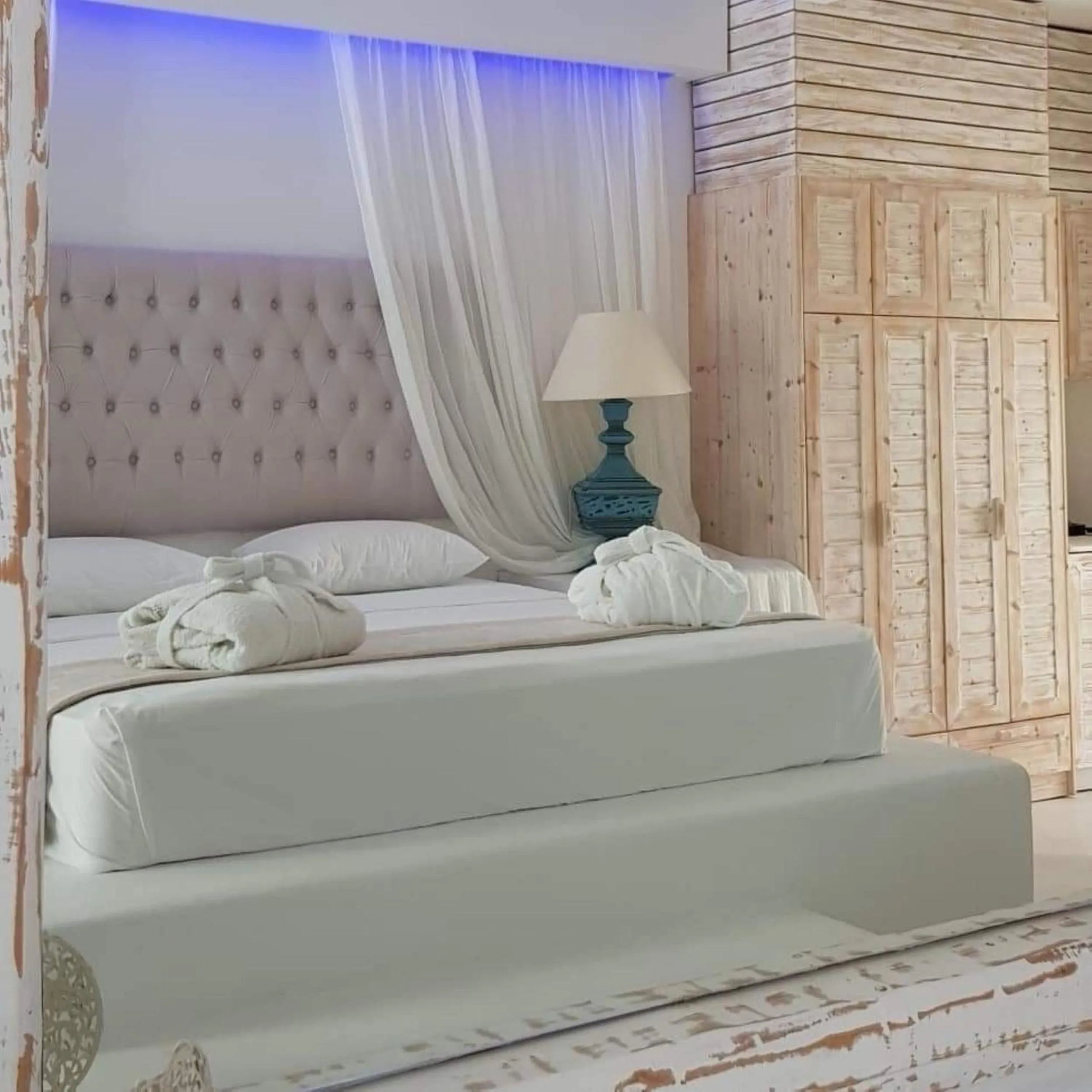 Bedroom, Bed in Kouros Home & Suites