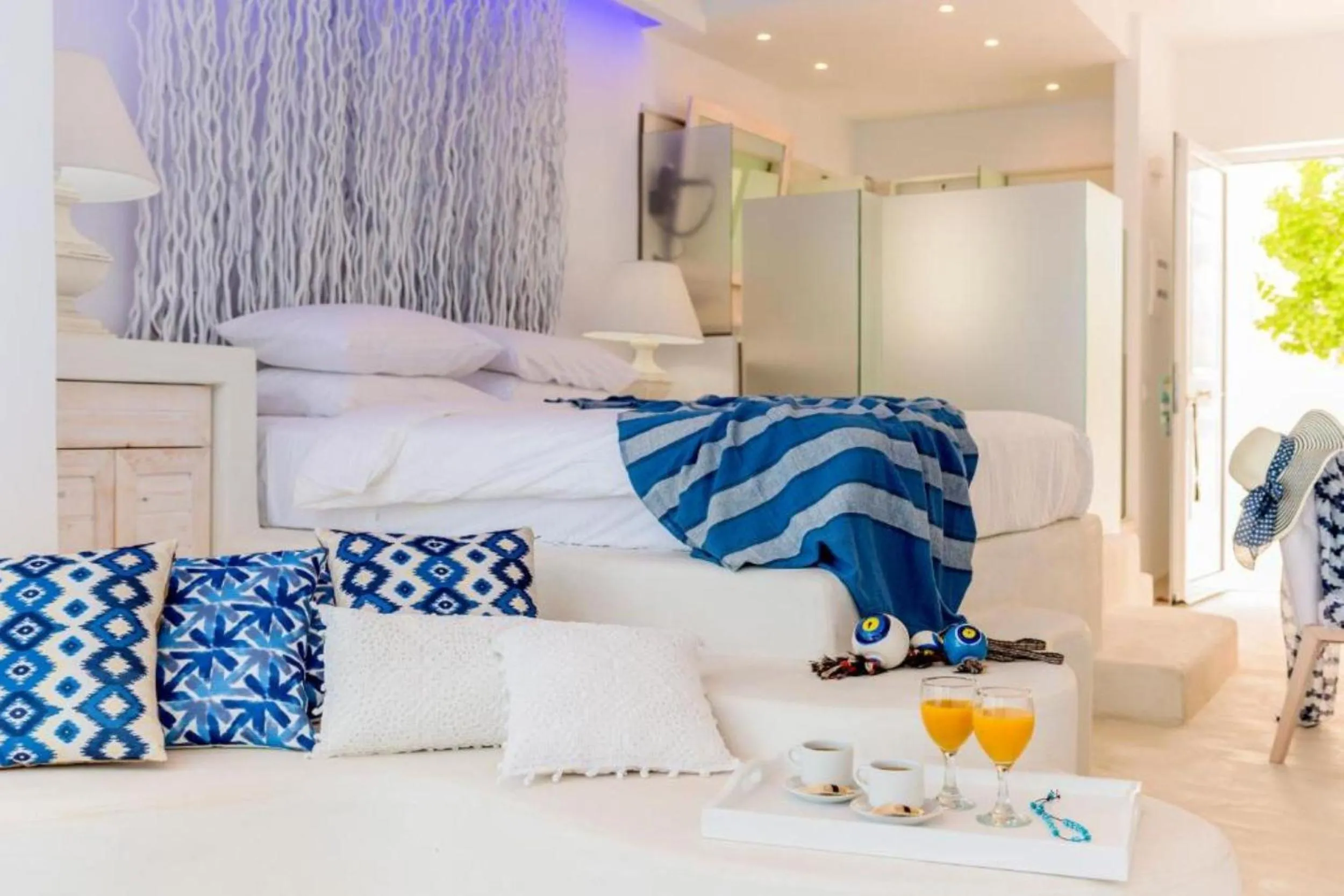 Bed in Kouros Home & Suites