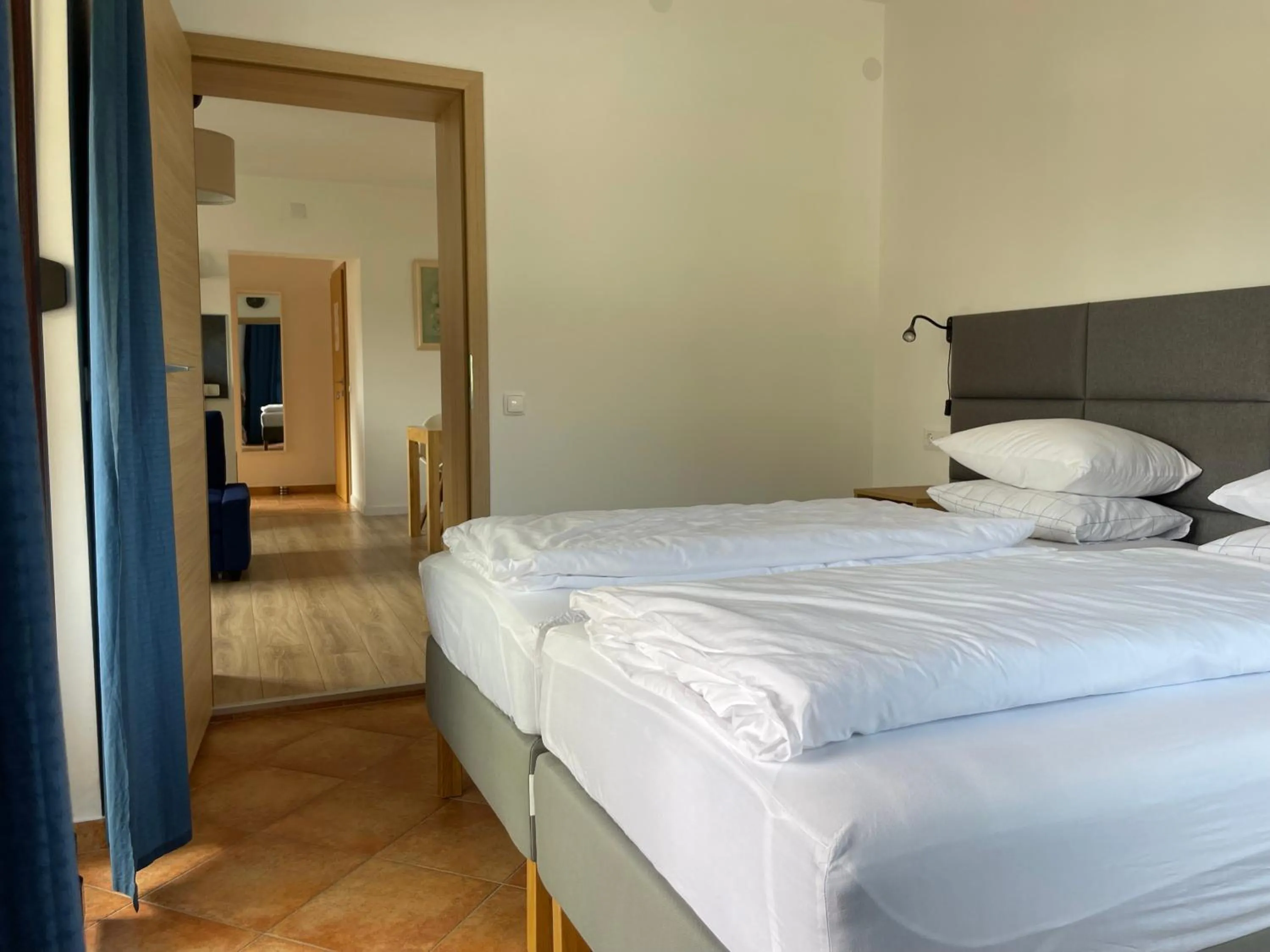 Bed in All Seasons Apartments Laško