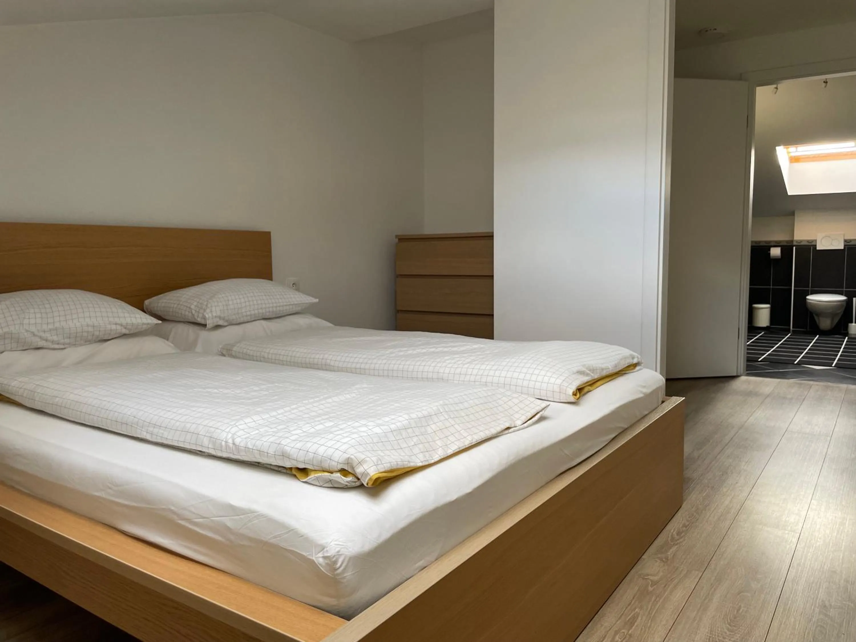 Bed in All Seasons Apartments Laško