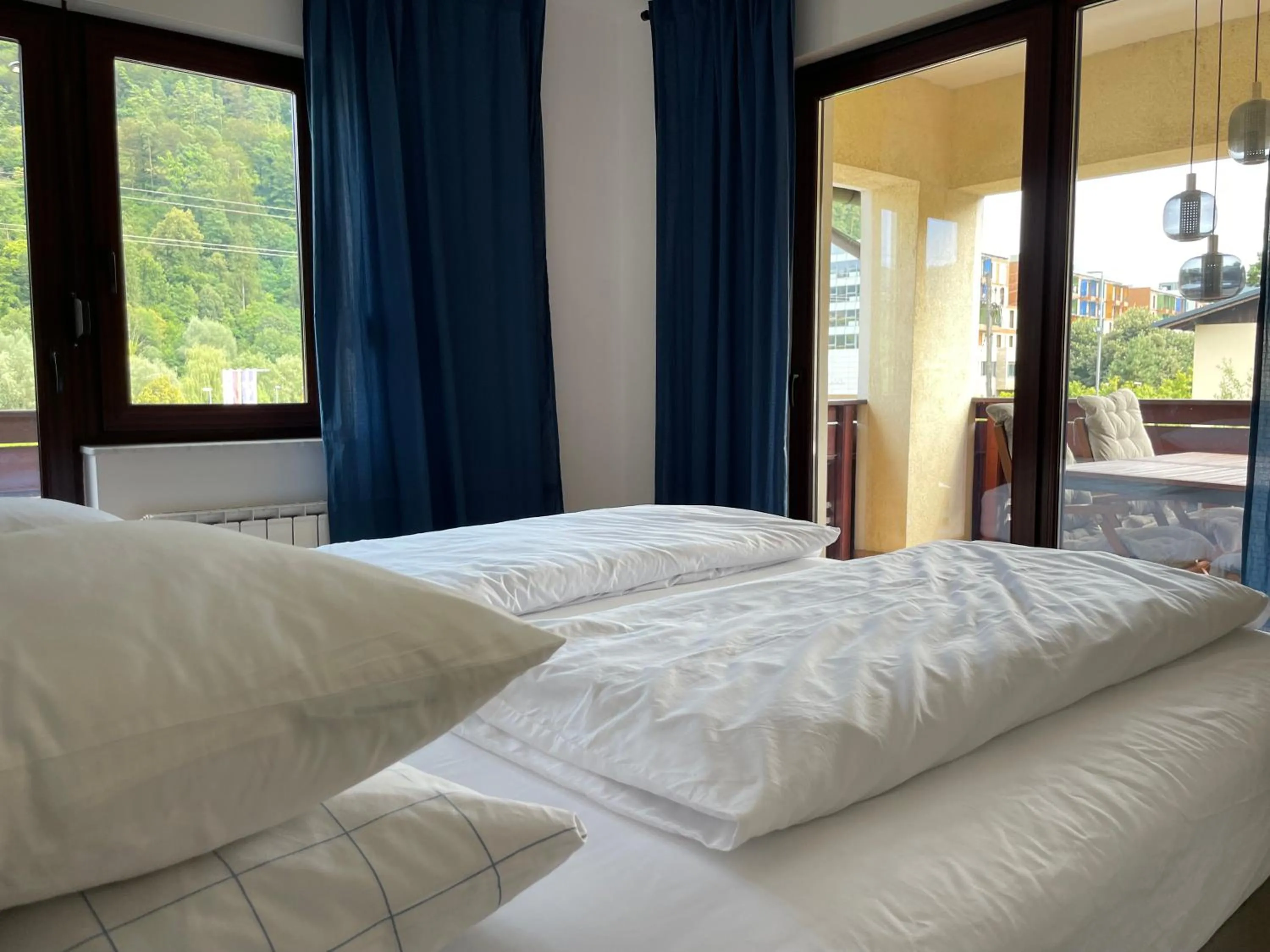 Bed in All Seasons Apartments Laško