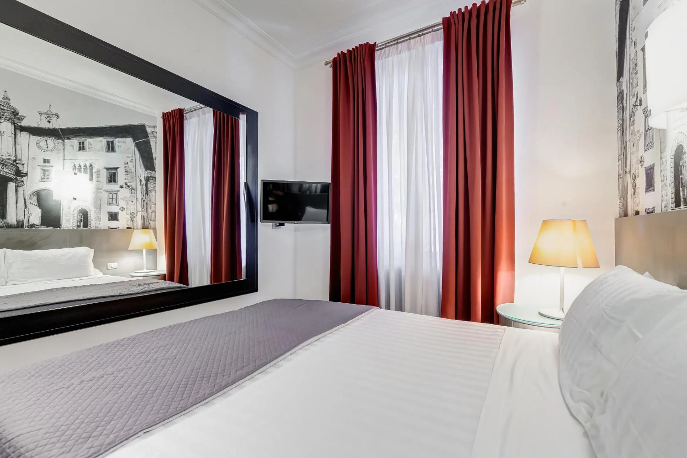 Bed in Residenza A -Via Veneto Fashion Rooms -self check-in