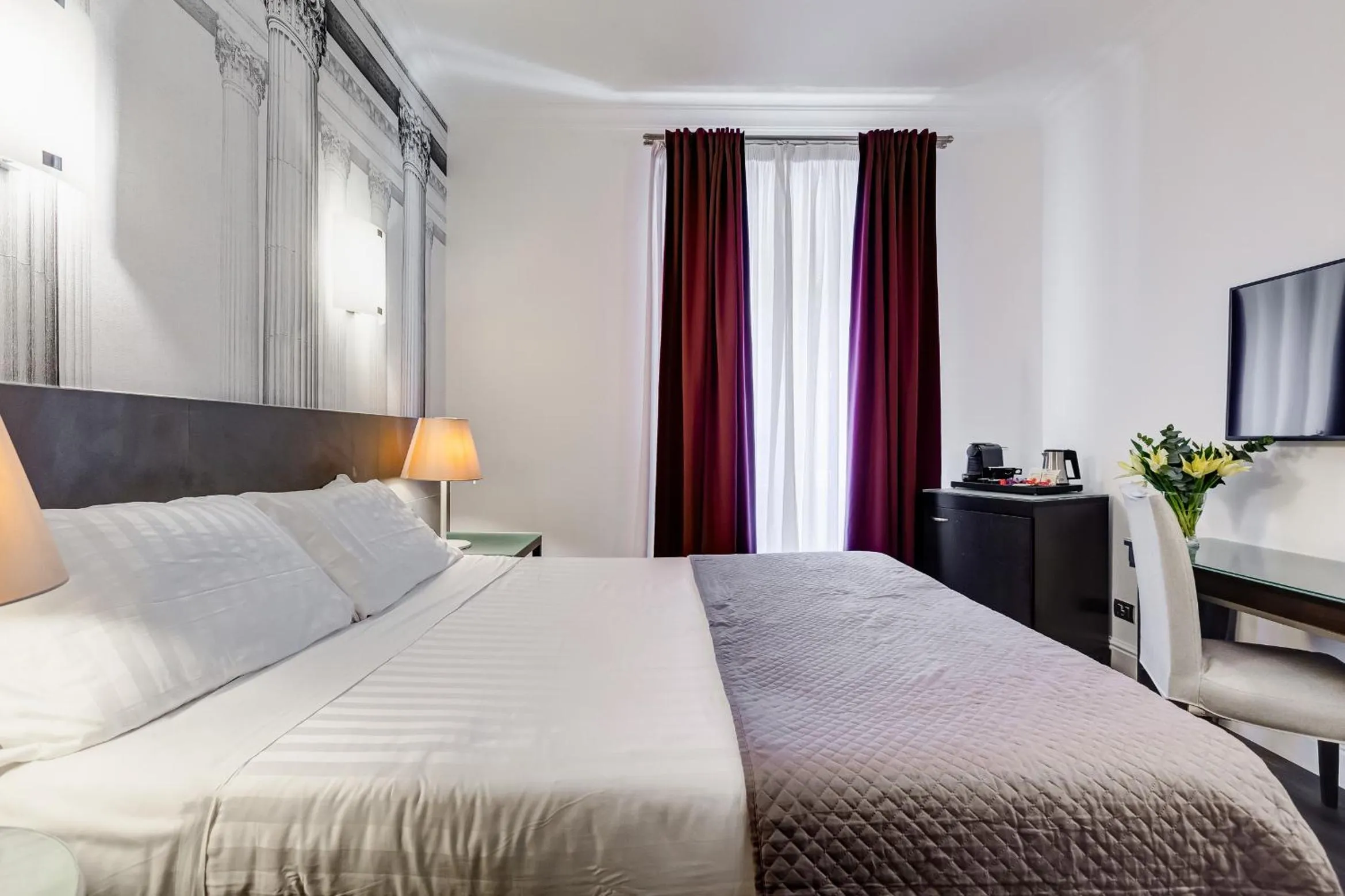 Bed in Residenza A -Via Veneto Fashion Rooms -self check-in