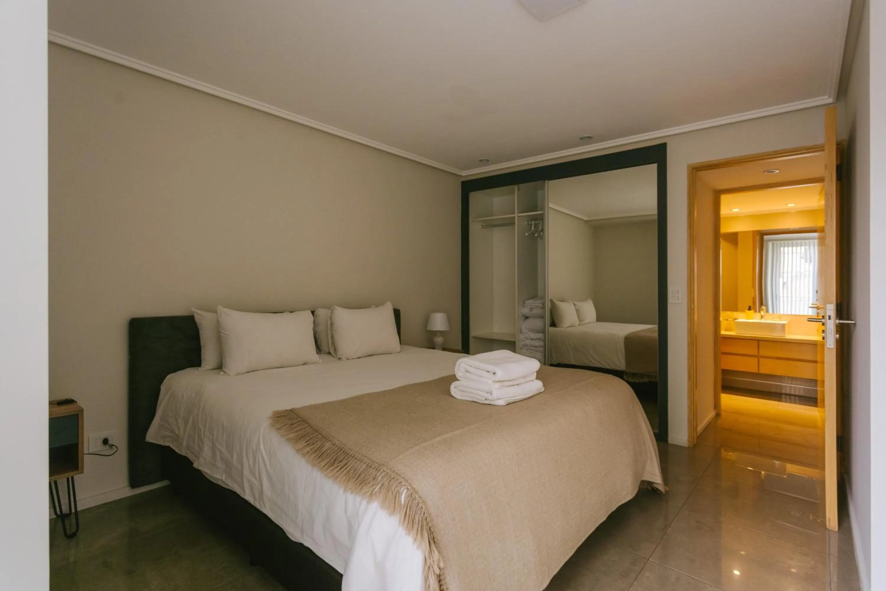 Bed in Le Montreal Apartments