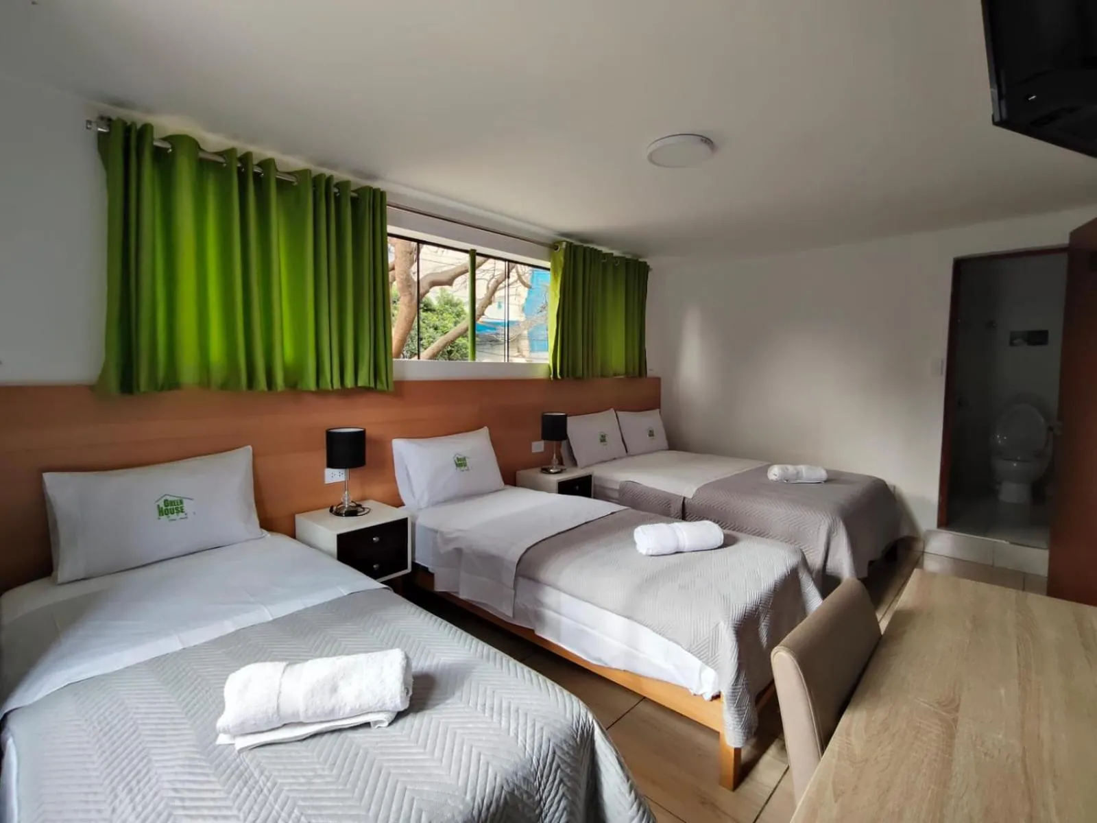 Photo of the whole room, Bed in Green House