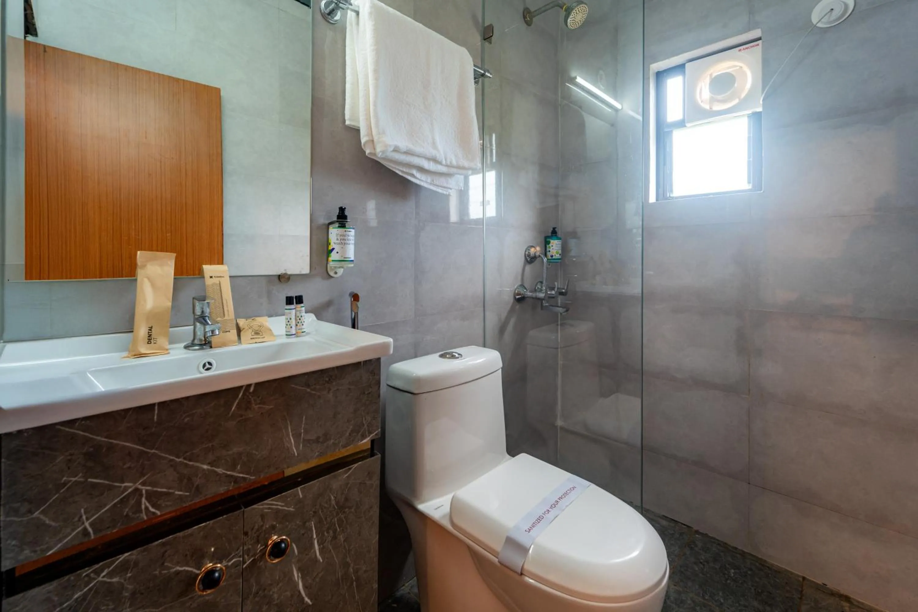 Bathroom in Treebo Clarissa Resort with Swimming Pool
