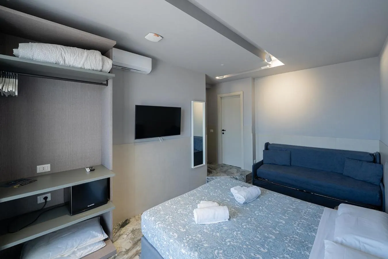 Bed in Mia Suites Hotel Bella Capri