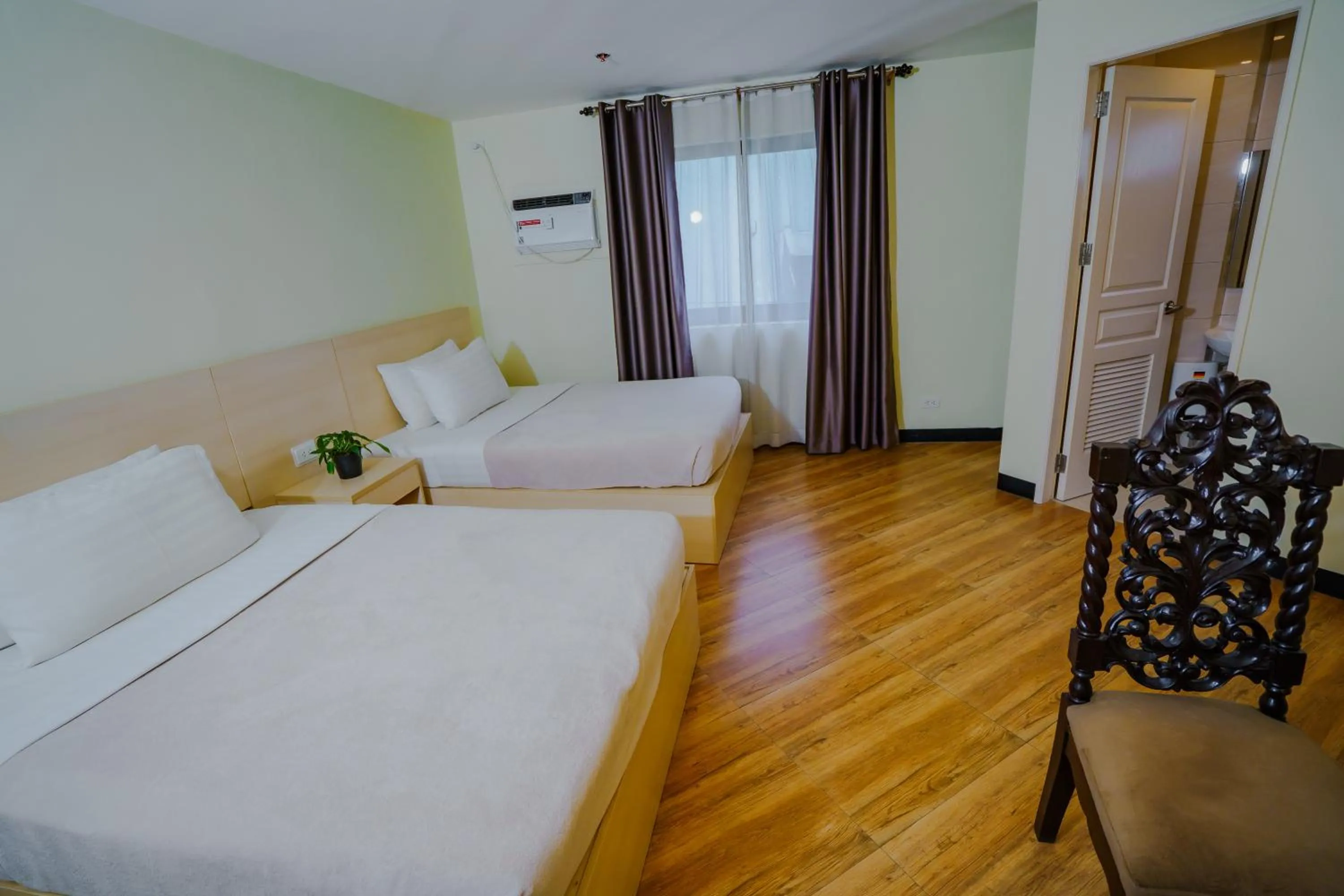 Photo of the whole room, Bed in Olive Town Center and Hotel