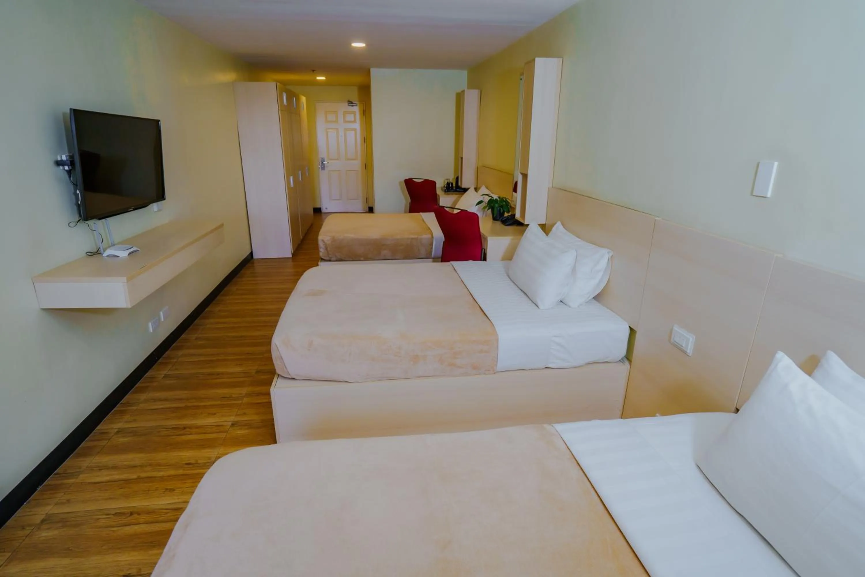 Photo of the whole room, Bed in Olive Town Center and Hotel