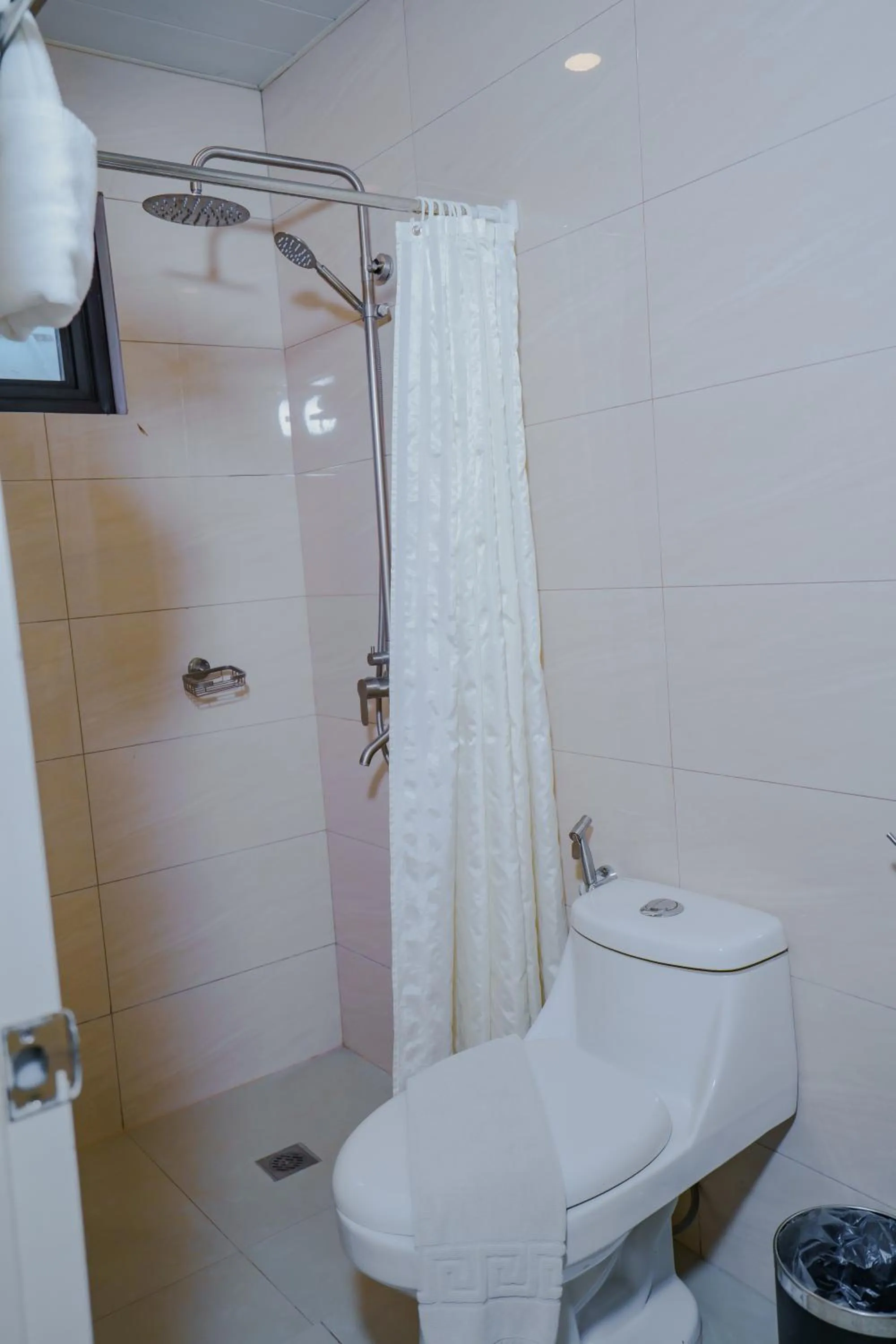 Bathroom in Olive Town Center and Hotel