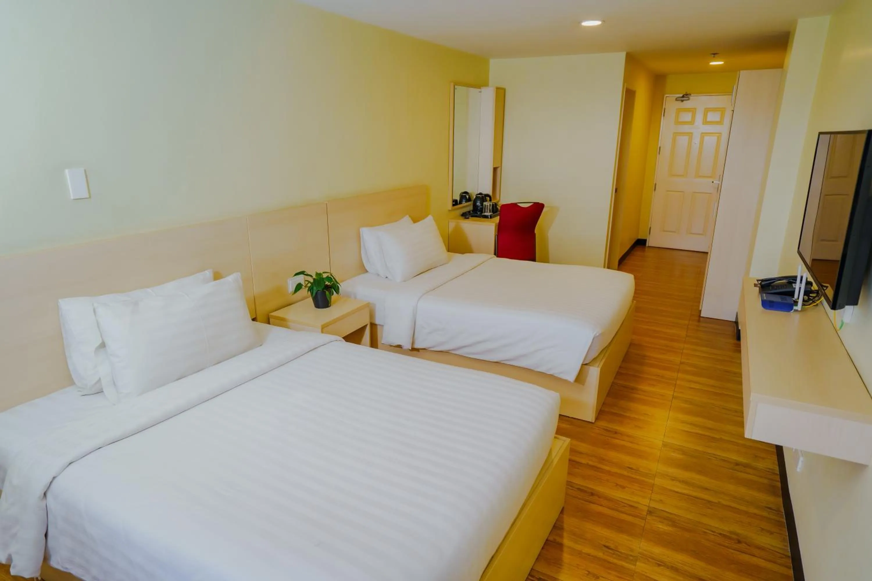 Bedroom, Bed in Olive Town Center and Hotel