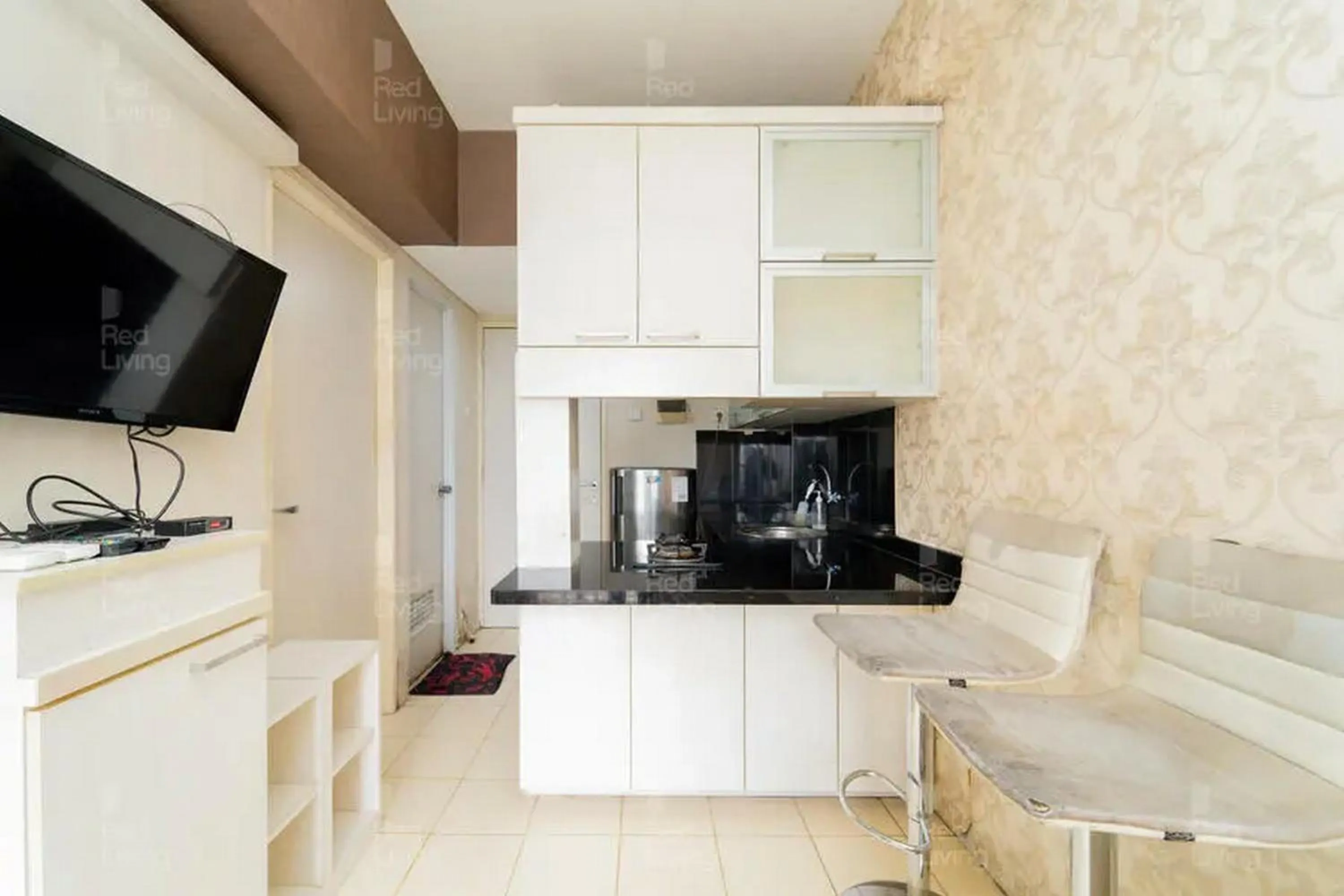 Kitchen or kitchenette in RedLiving Apartemen Serpong Green View - Sheena Property Tower B