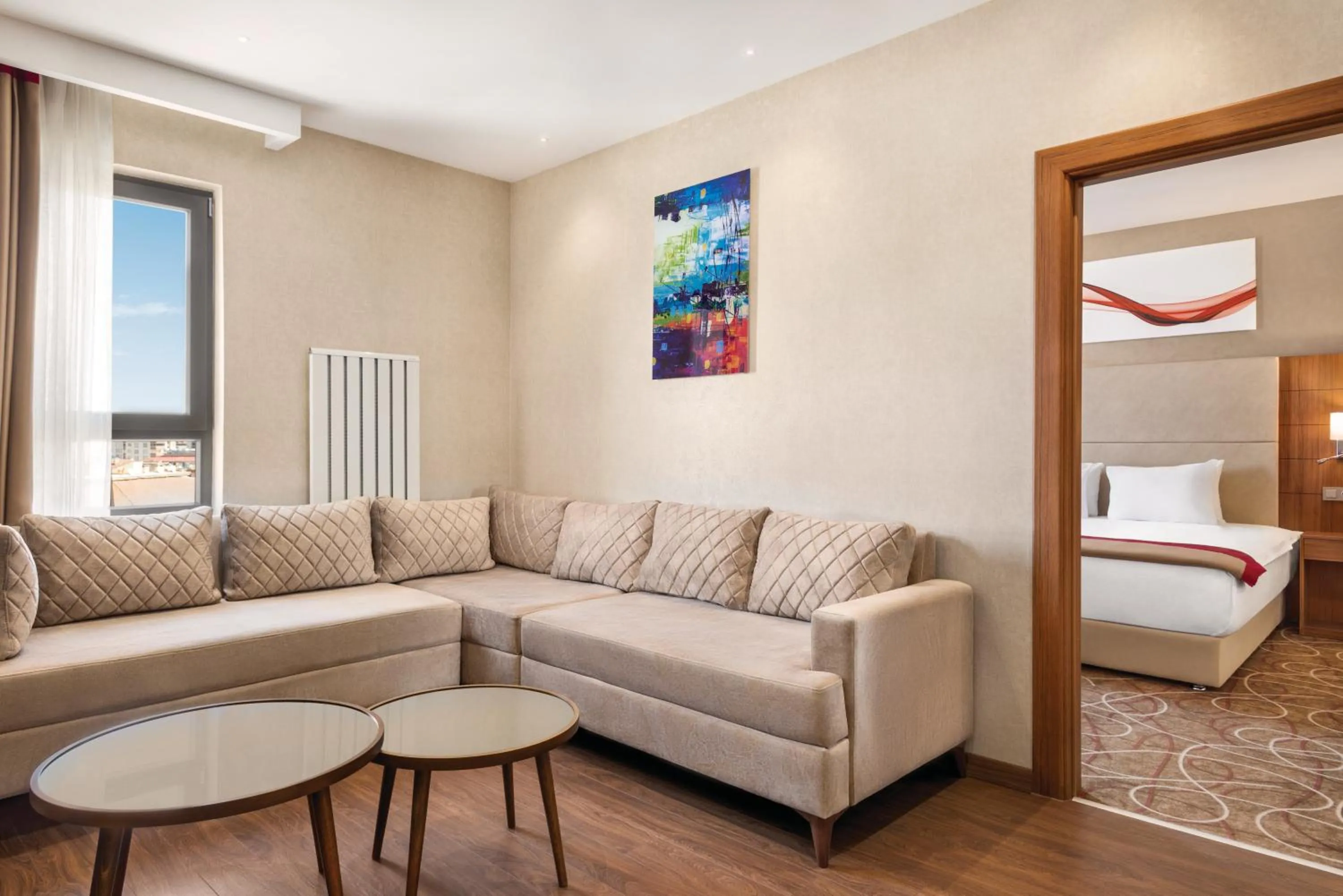 Seating area, Bed in Ramada By Wyndham Elbistan