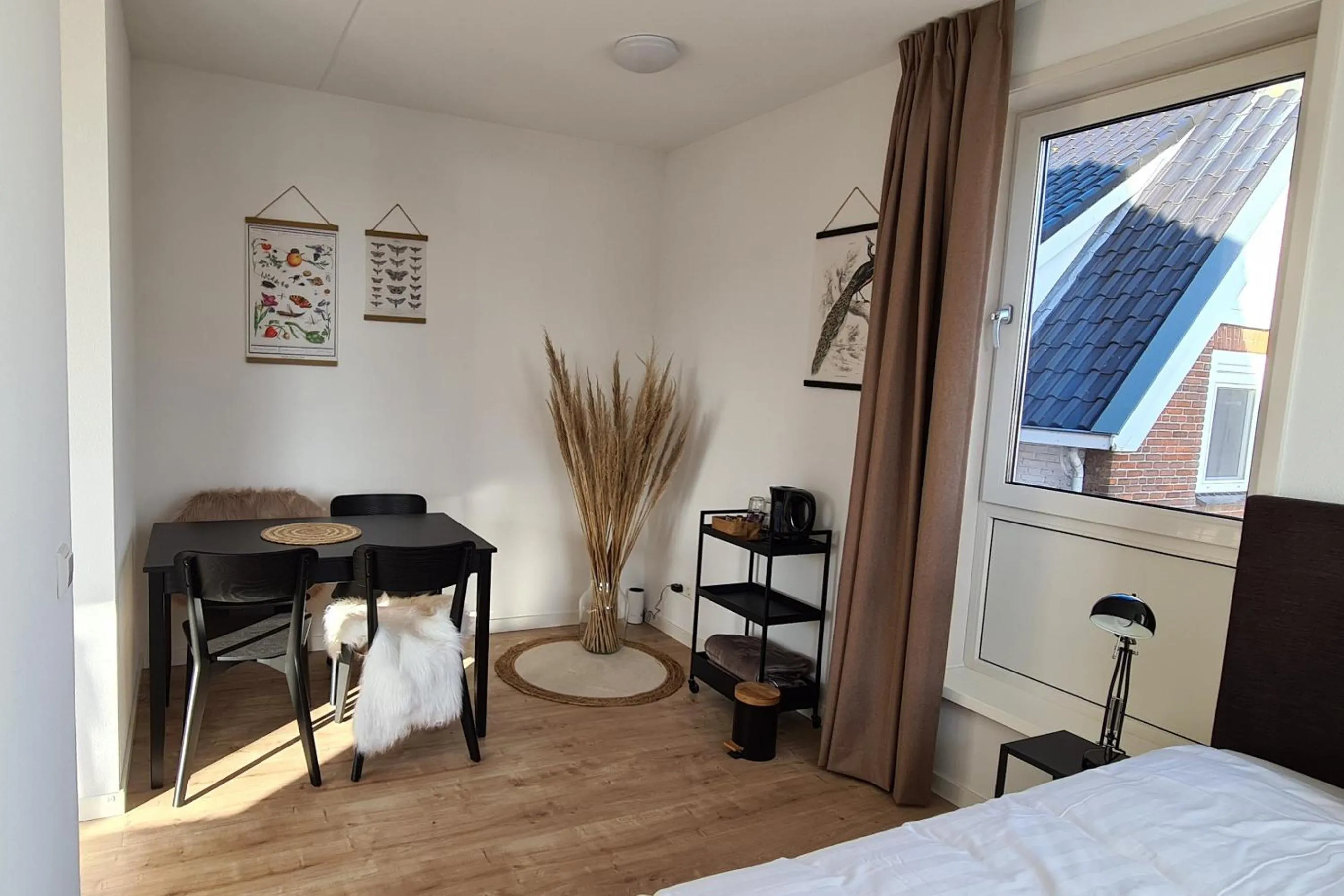 Seating area, Bed in B&B Het Groene Hart