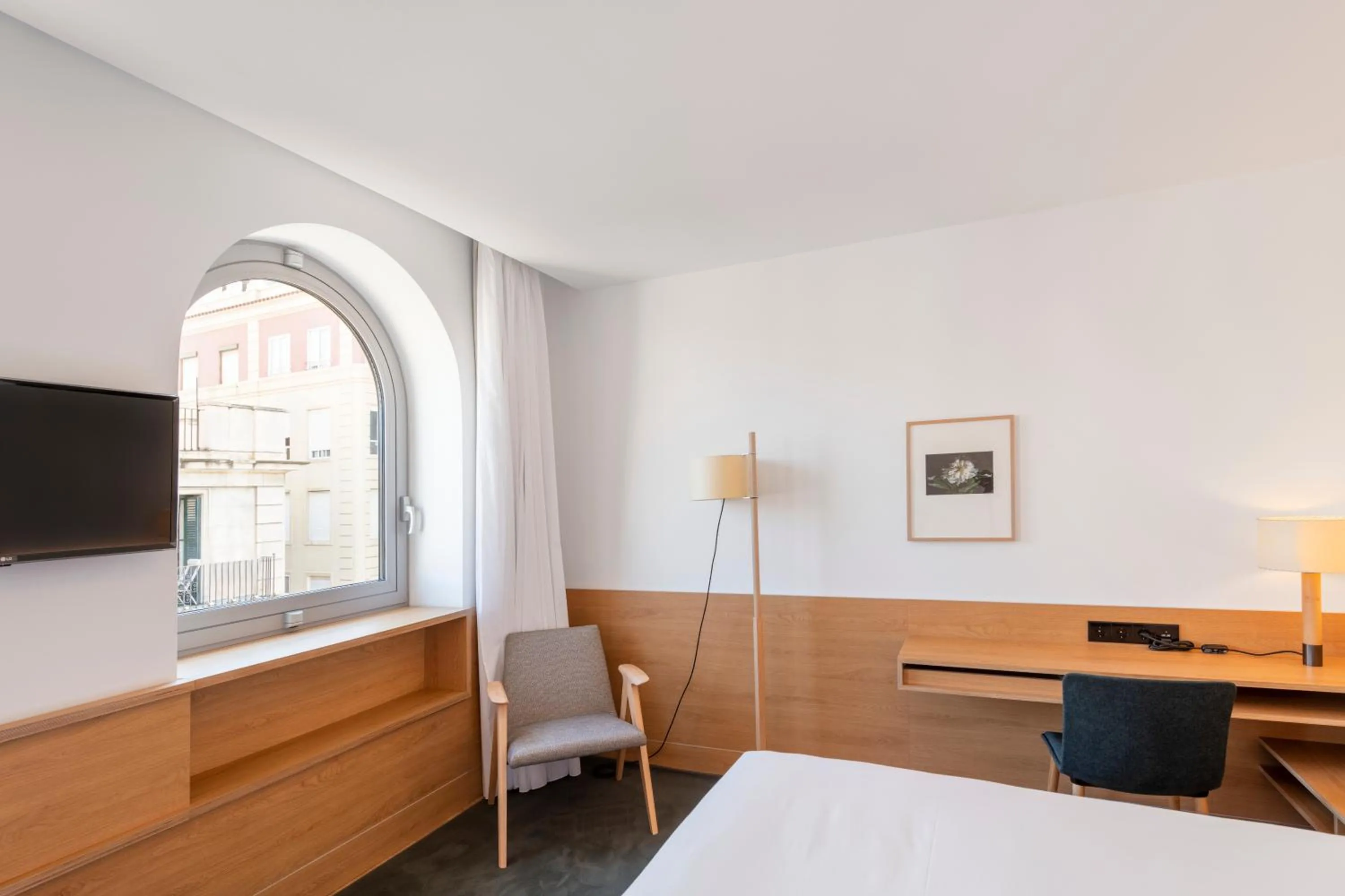 Seating area, Bed in Eurostars Pórtico Alicante