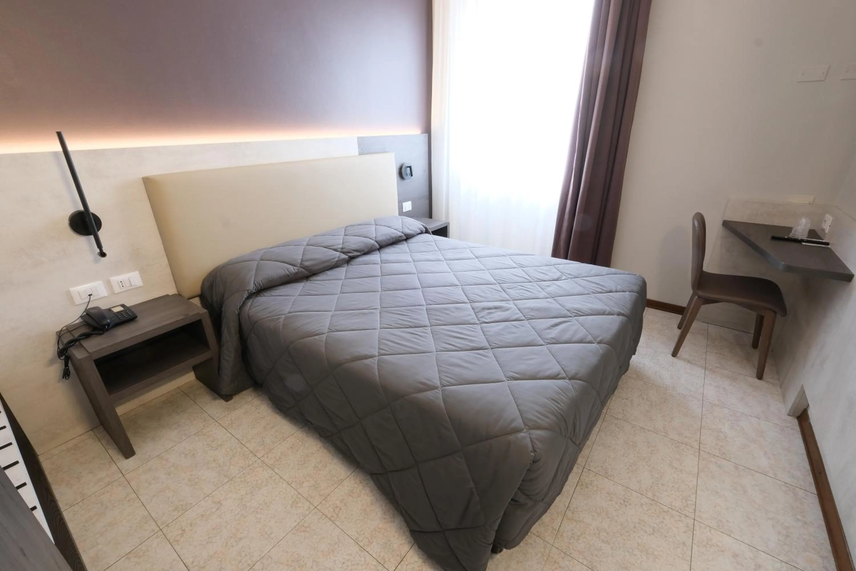 Bed in Hotel Mistral