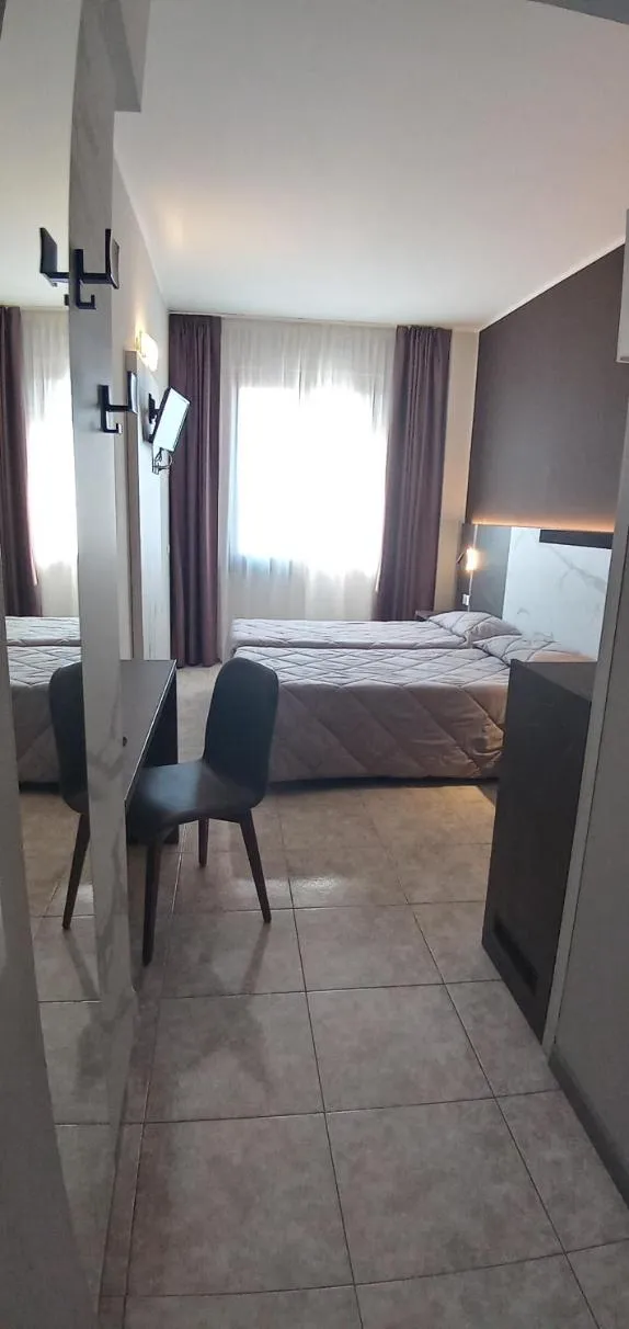 Bed in Hotel Mistral