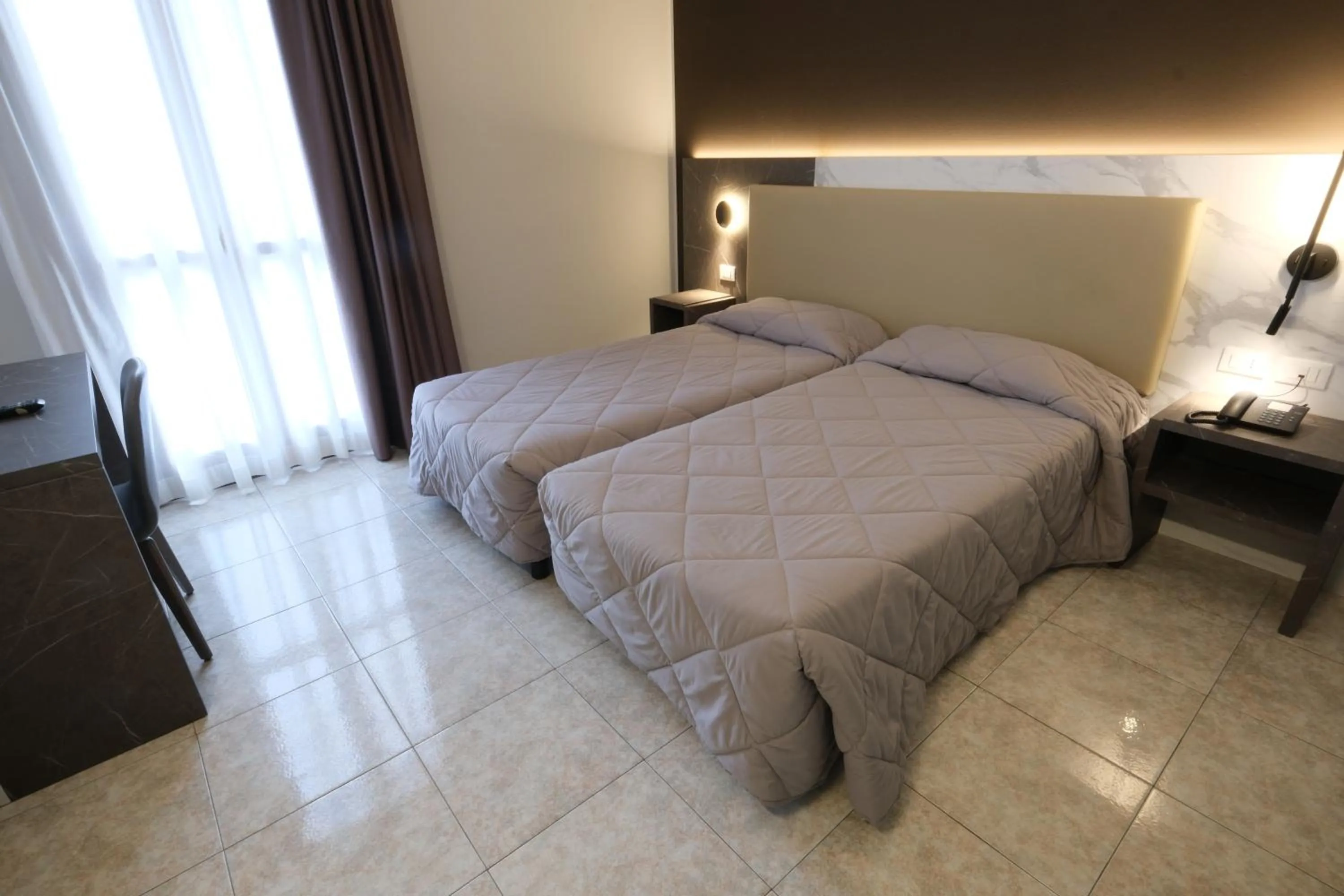 Bed in Hotel Mistral